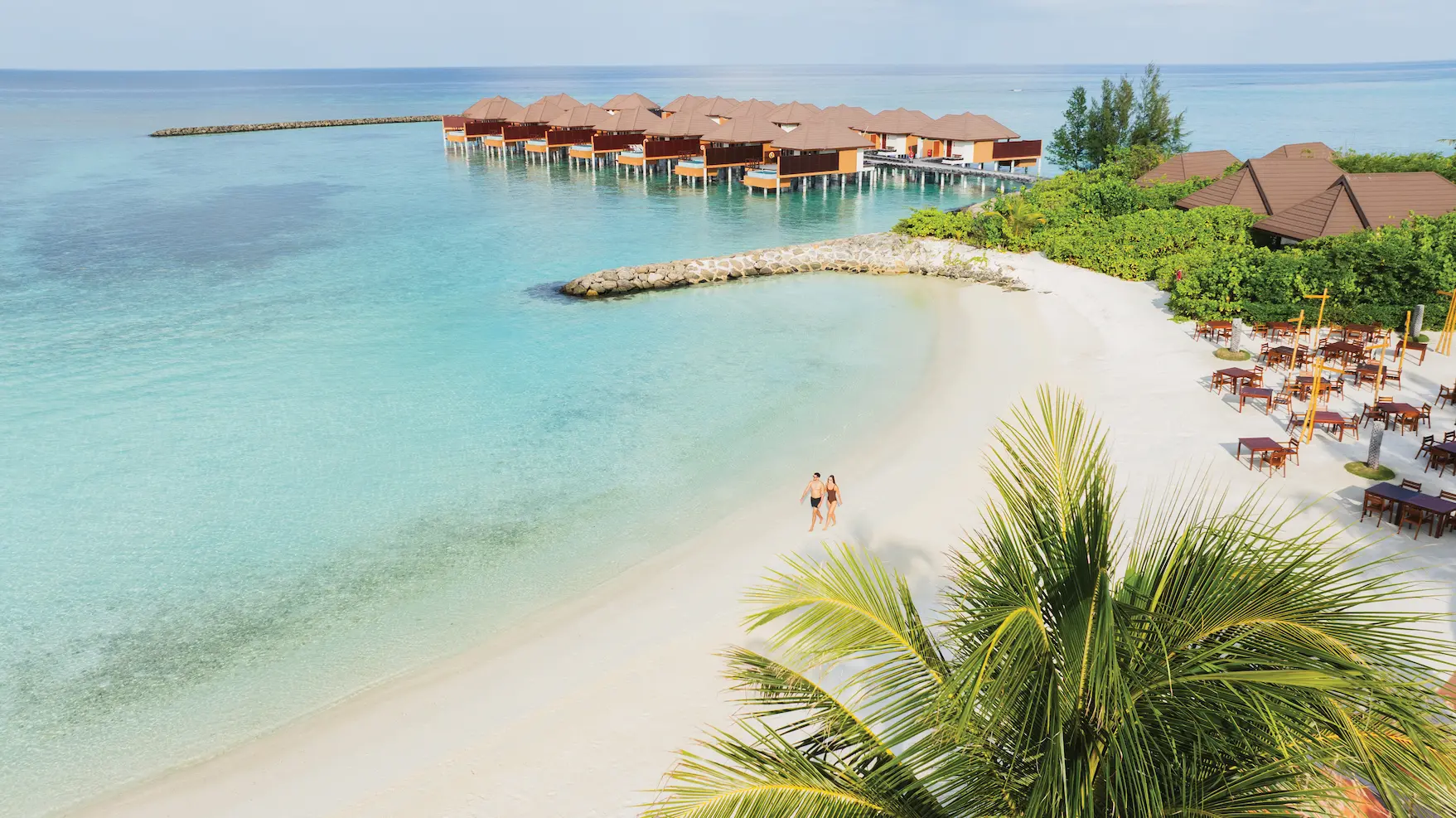 tropical beach at varu by atmosphere maldives with soft white sand and crystal clear waters