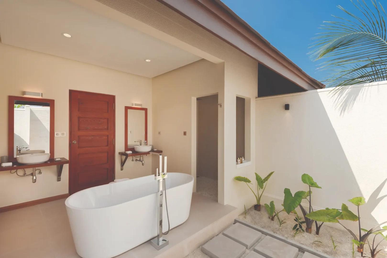 luxury beach villa bathroom at varu by atmosphere maldives with modern design