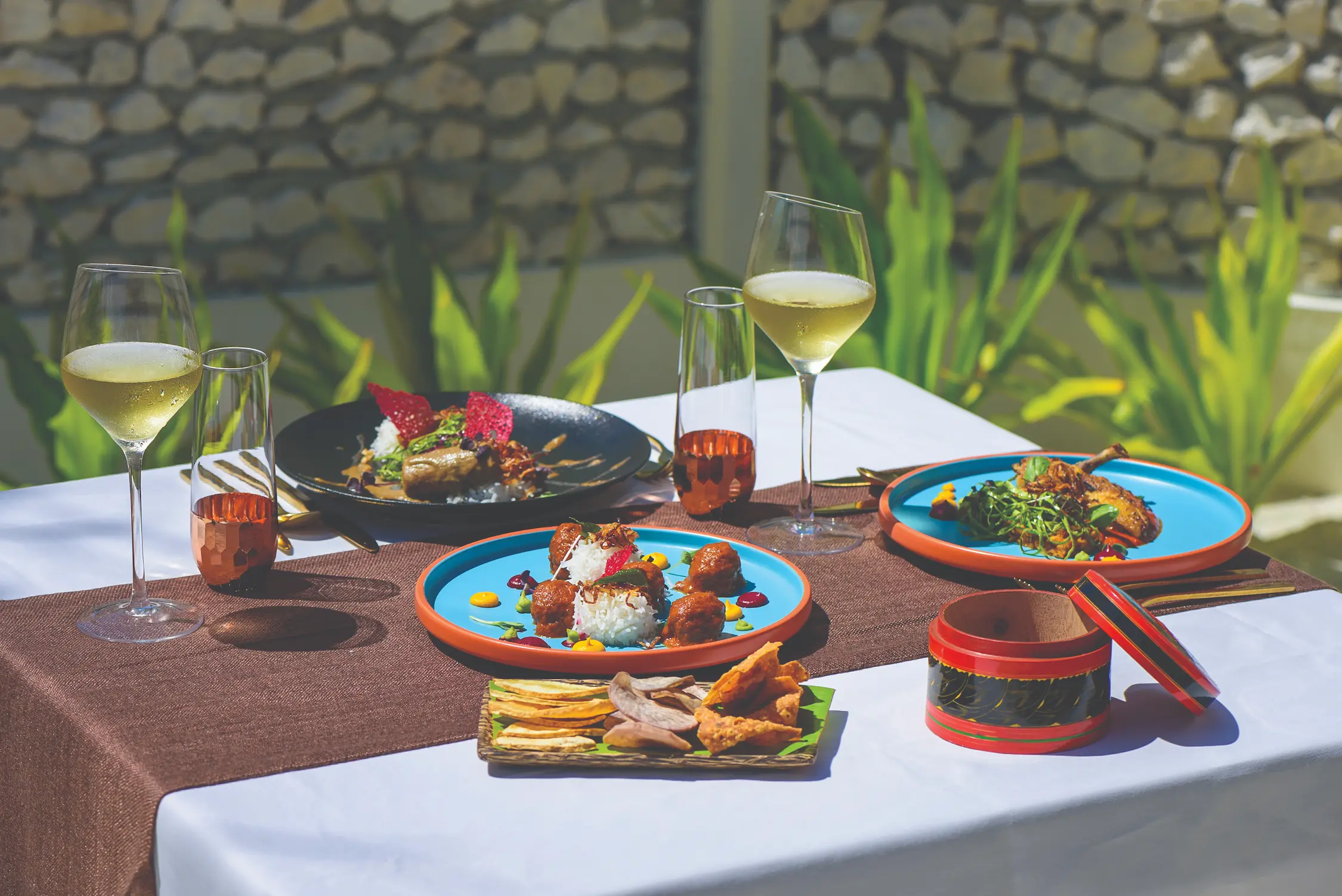 traditional dining table setup at kaage restaurant at varu by atmosphere maldives showcasing authentic local cuisine