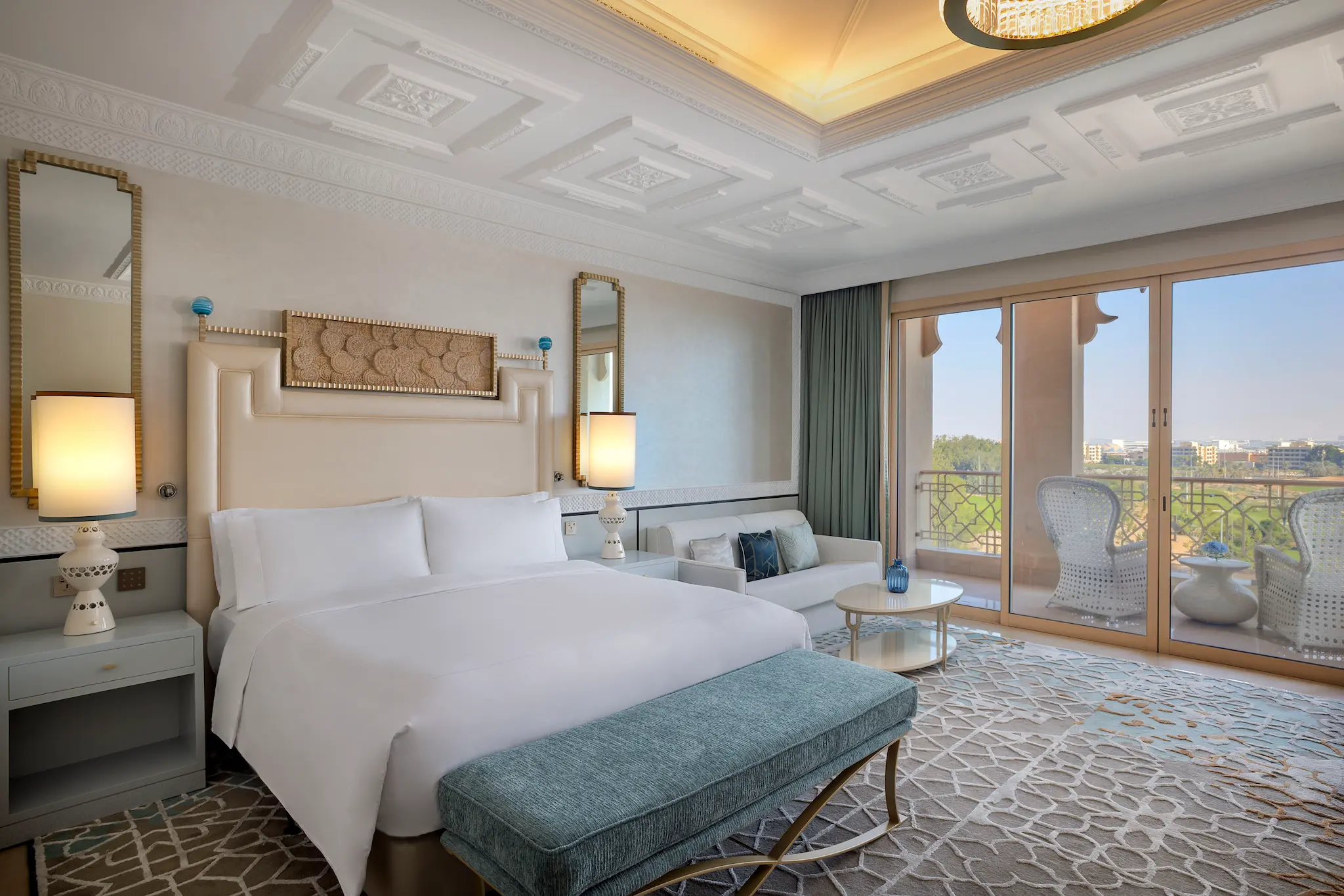waldorf astoria ras al khaimah king premier golf course view room with balcony overlooking the greens