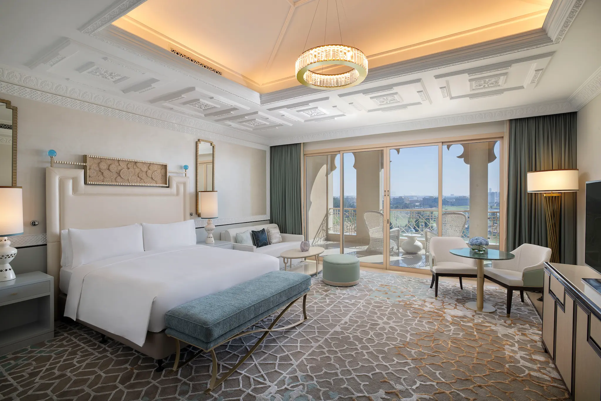 waldorf astoria ras al khaimah king premier golf course view room overview with elegant interiors overlooking the greens