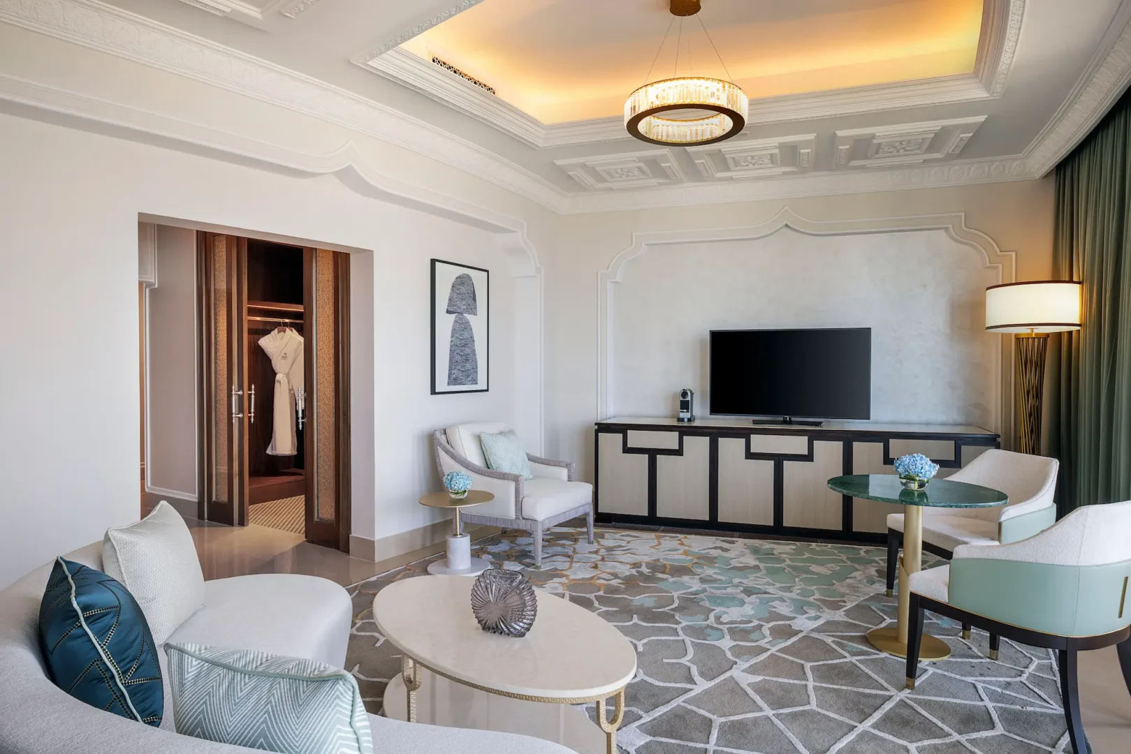 waldorf astoria ras al khaimah king premier ocean view room living area with modern lounge seating and ocean ambience