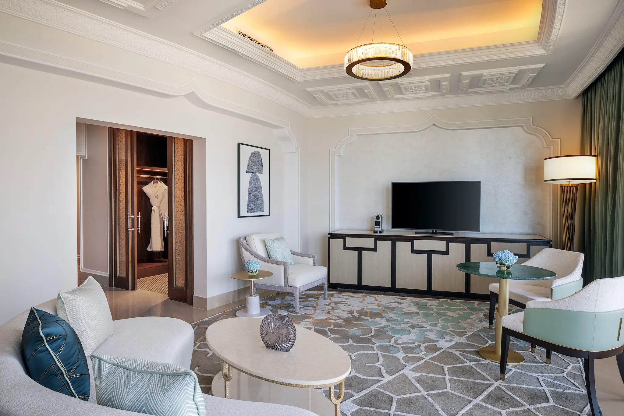 waldorf astoria ras al khaimah king premier ocean view room living area with modern lounge seating and ocean ambience