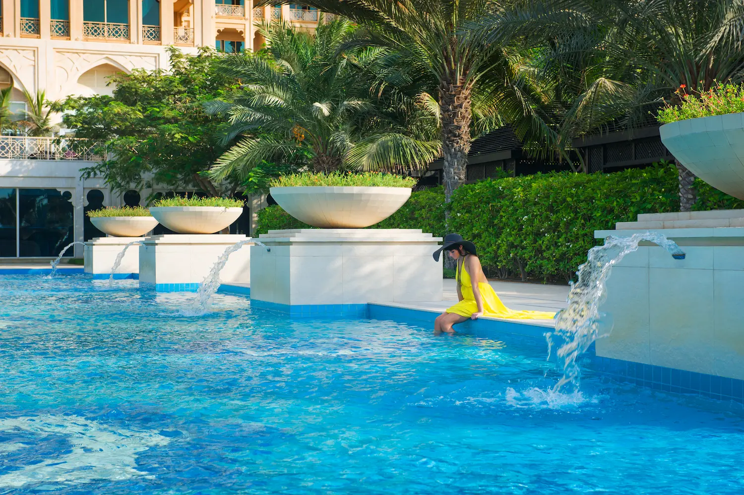 waldorf astoria ras al khaimah lifestyle photoshoot fountain capturing elegant moments within the resort surroundings
