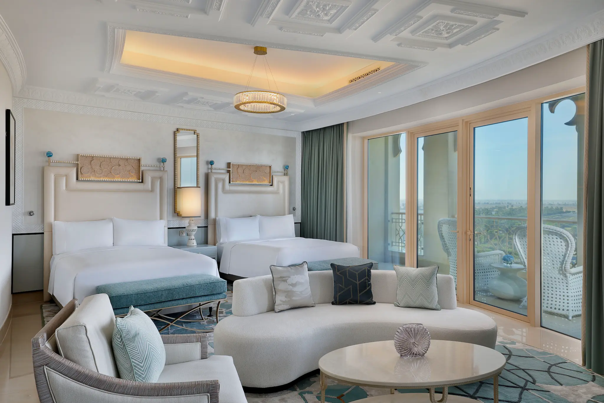 waldorf astoria ras al khaimah two queen beds deluxe room overview with spacious modern interior