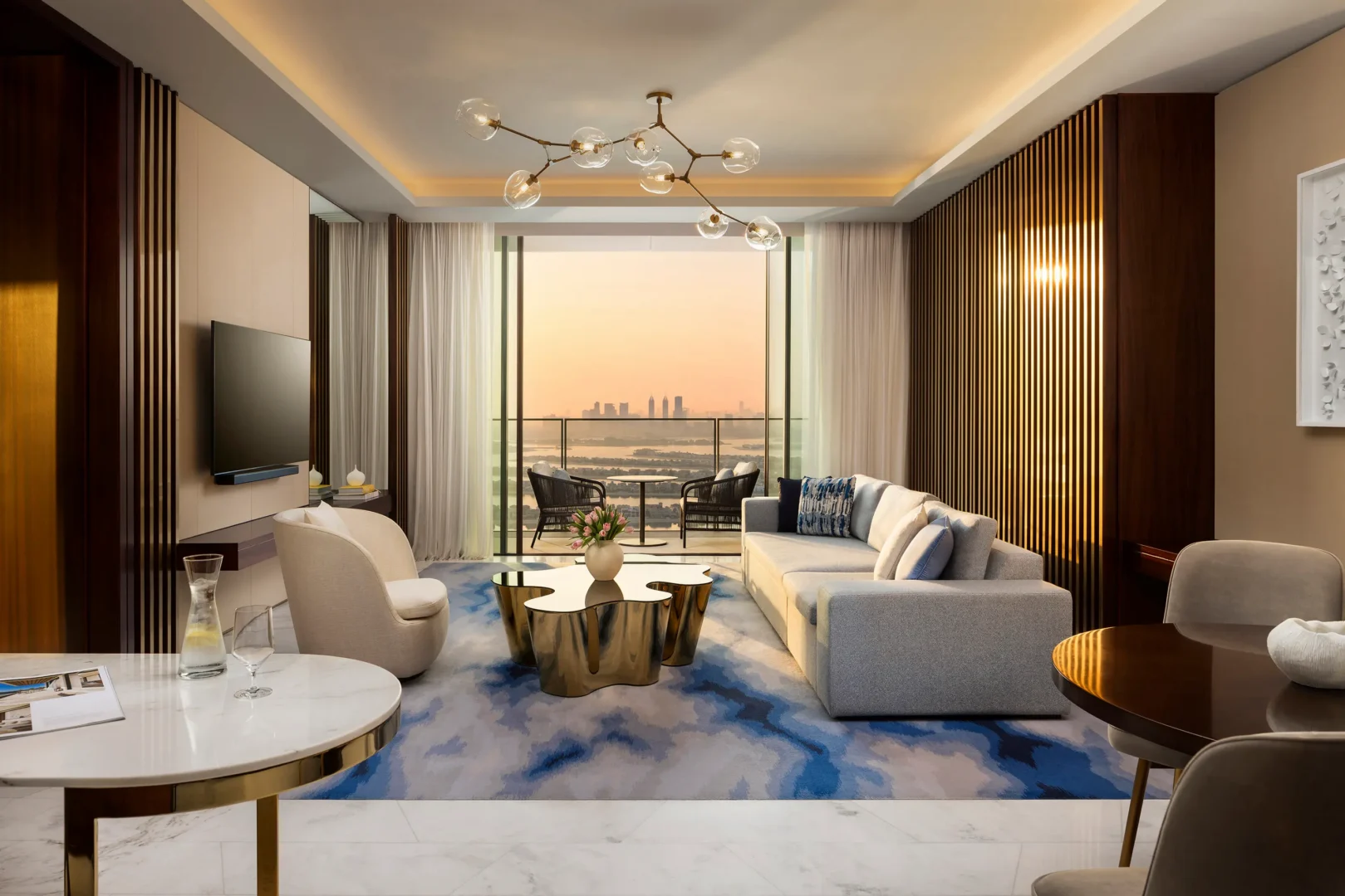 two bedroom cross connecting sky terrace suite living room with palm view at atlantis the royal dubai