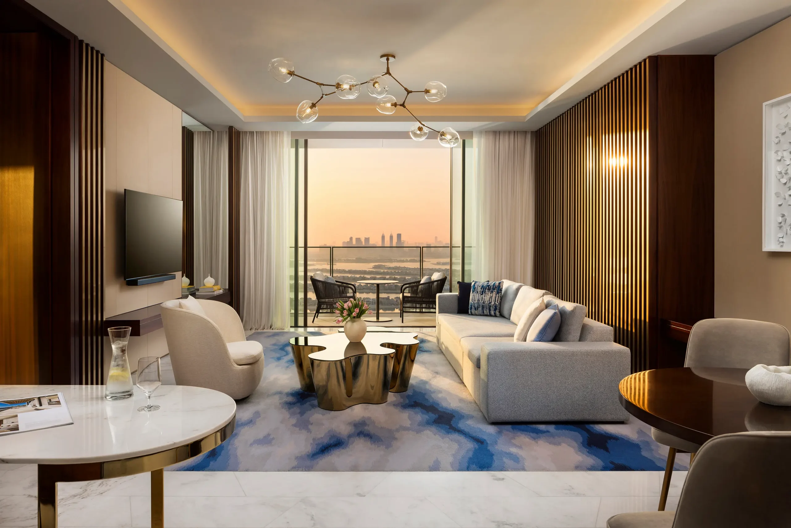 two bedroom cross connecting sky terrace suite living room with palm view at atlantis the royal dubai