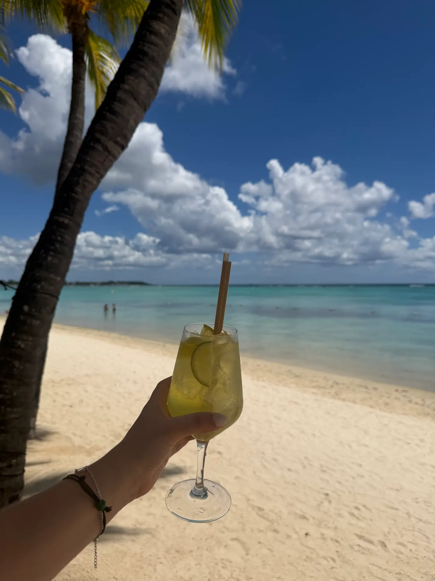 beachcomber resorts tropical cocktail served beachfront with ocean views and luxury island atmosphere