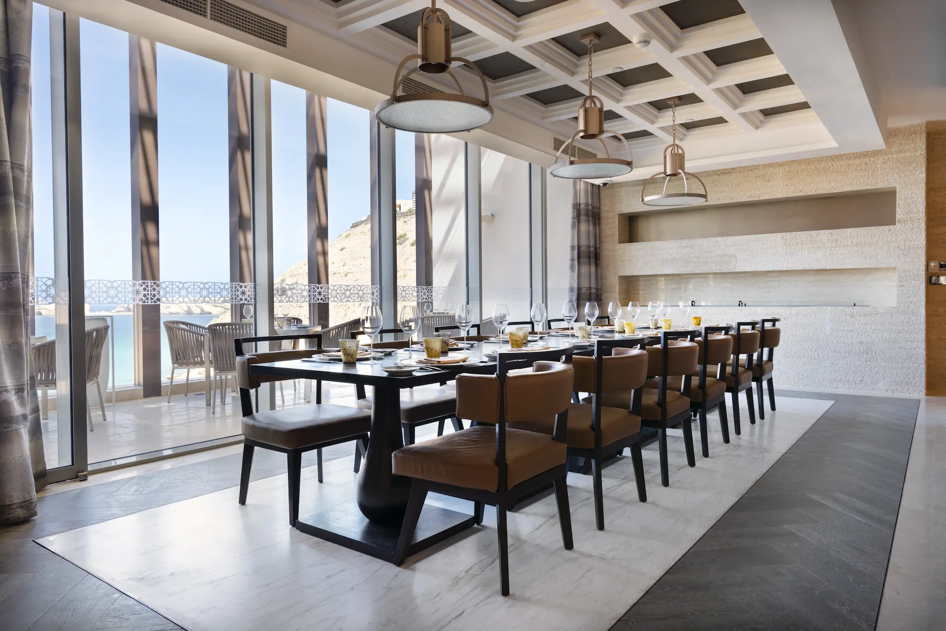 brezza restaurant at jumeirah muscat bay oman offering elegant coastal dining with ocean views and contemporary resort atmosphere