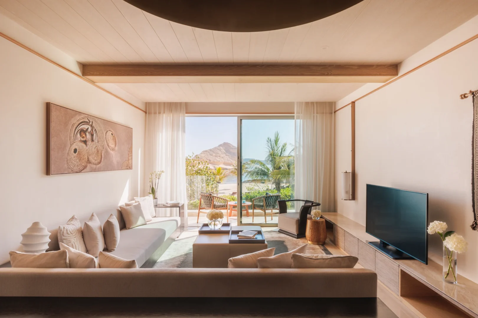 summerhouse with private pool at jumeirah muscat bay resort in oman overlooking the coast and surrounding mountains