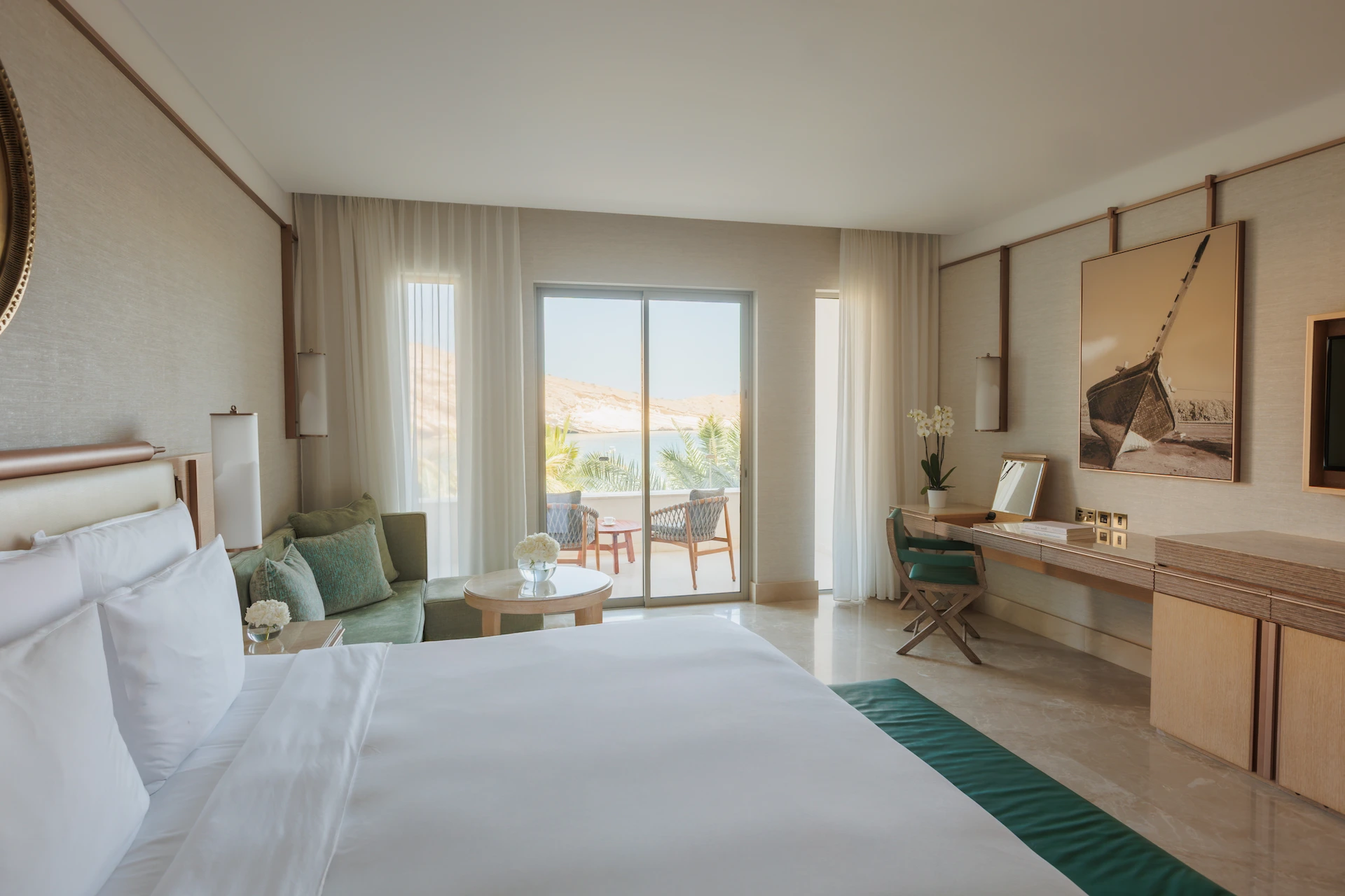 two bedroom family room at jumeirah muscat bay oman featuring spacious accommodation modern interiors and relaxing resort views