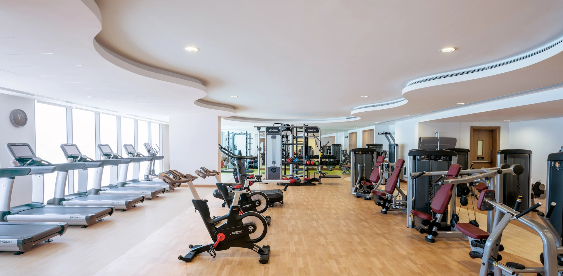 kempinski hotel muscat oman gym fitness center modern equipment weight training cardio machines resort health club