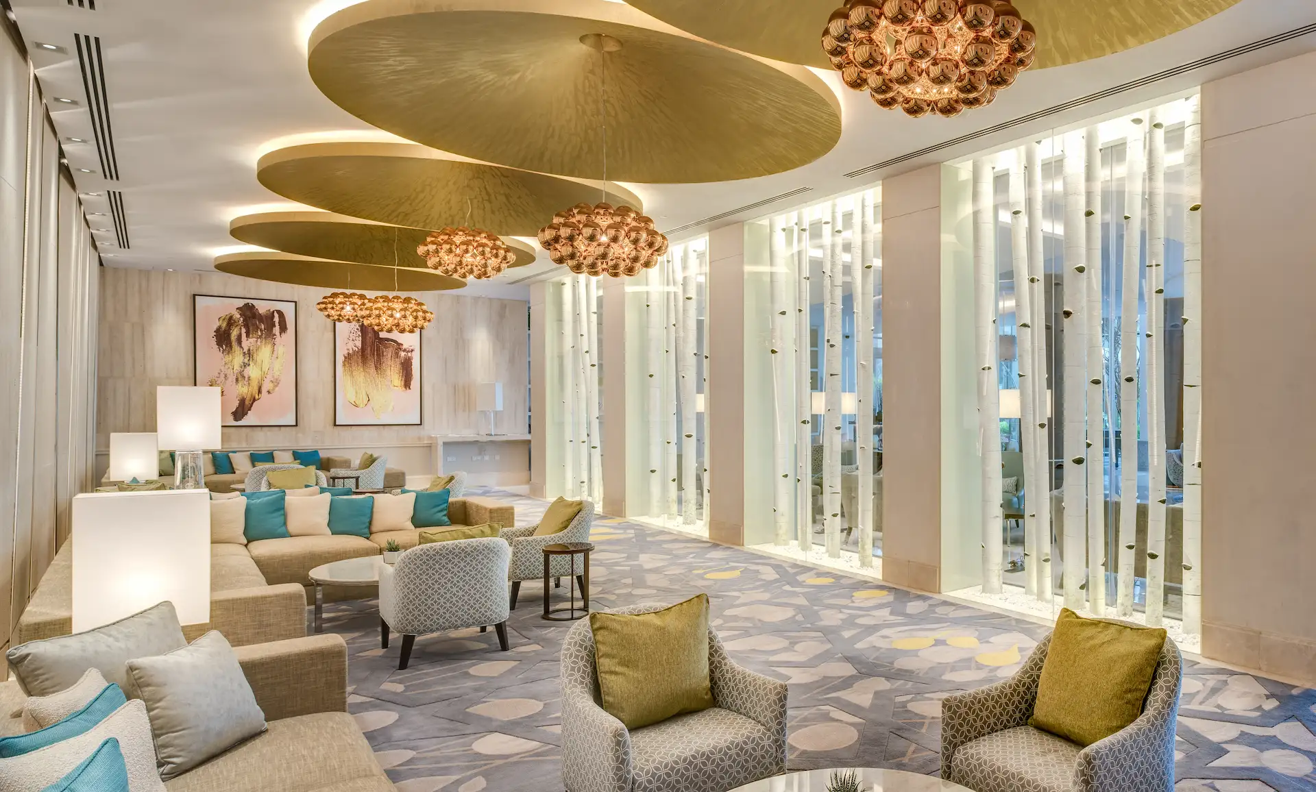 kempinski hotel muscat oman indoor area lobby corridor seating spaces modern luxury interior design