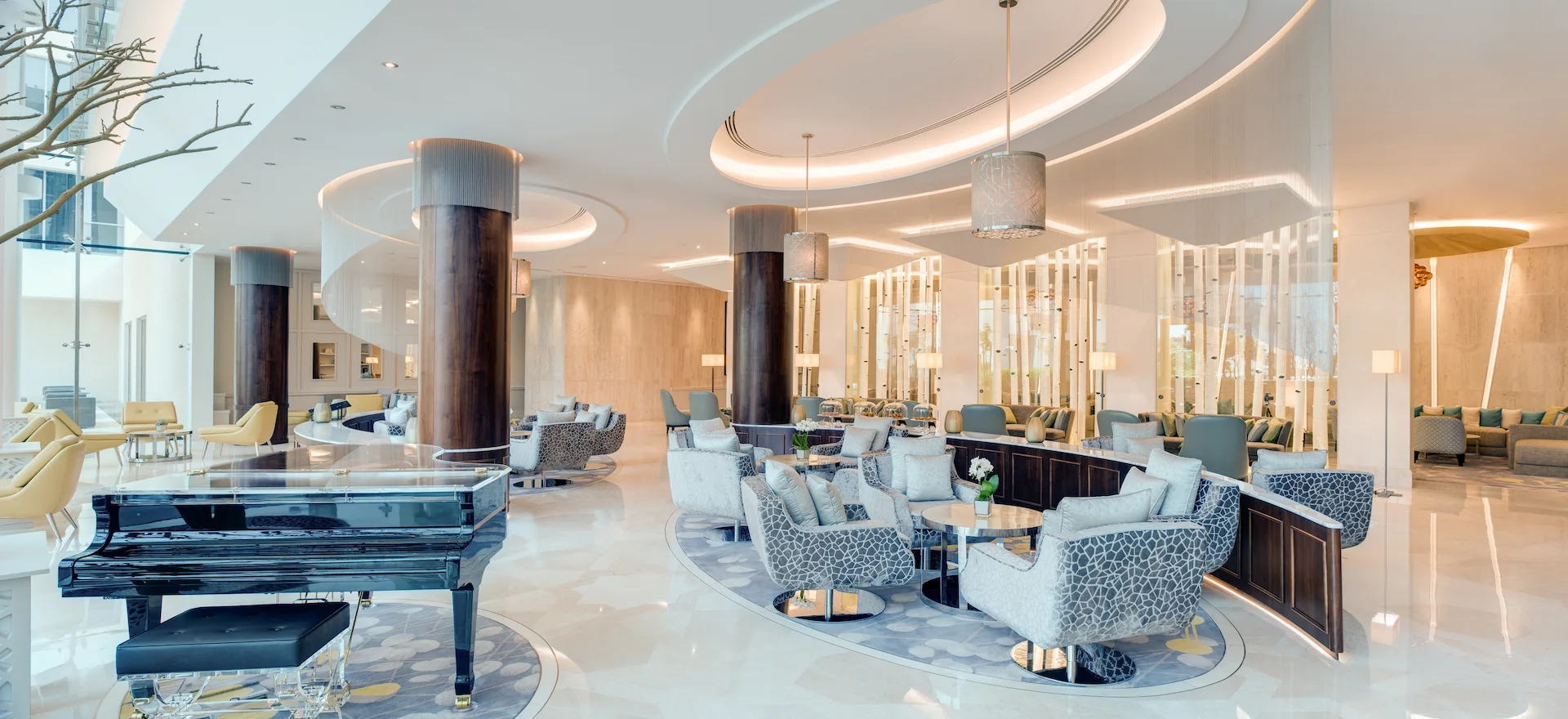 kempinski hotel muscat oman piano lounge elegant interior seating area live music venue