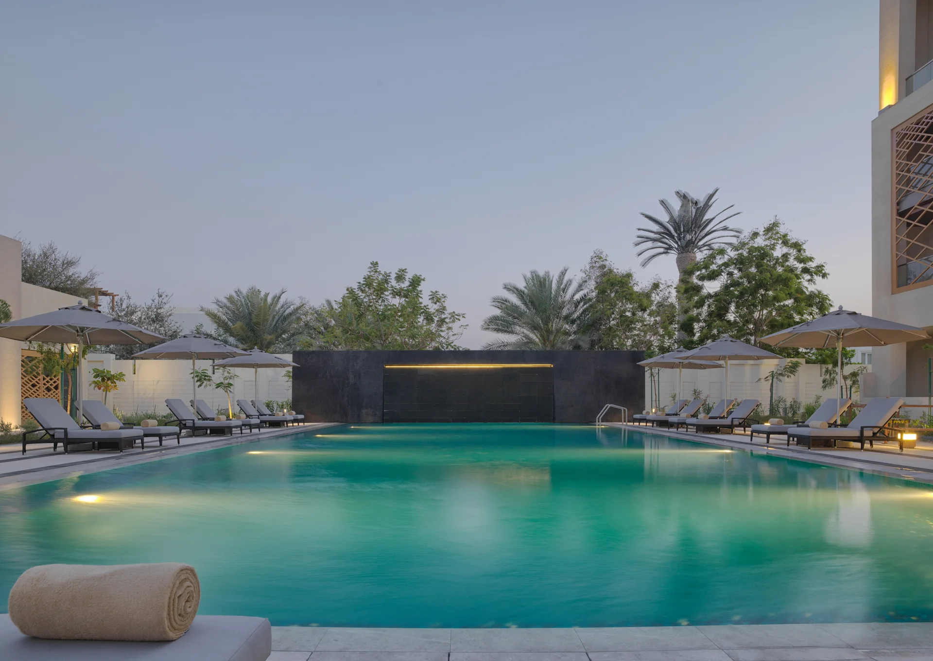 kempinski hotel muscat oman swimming pool resort outdoor infinity pool ocean view