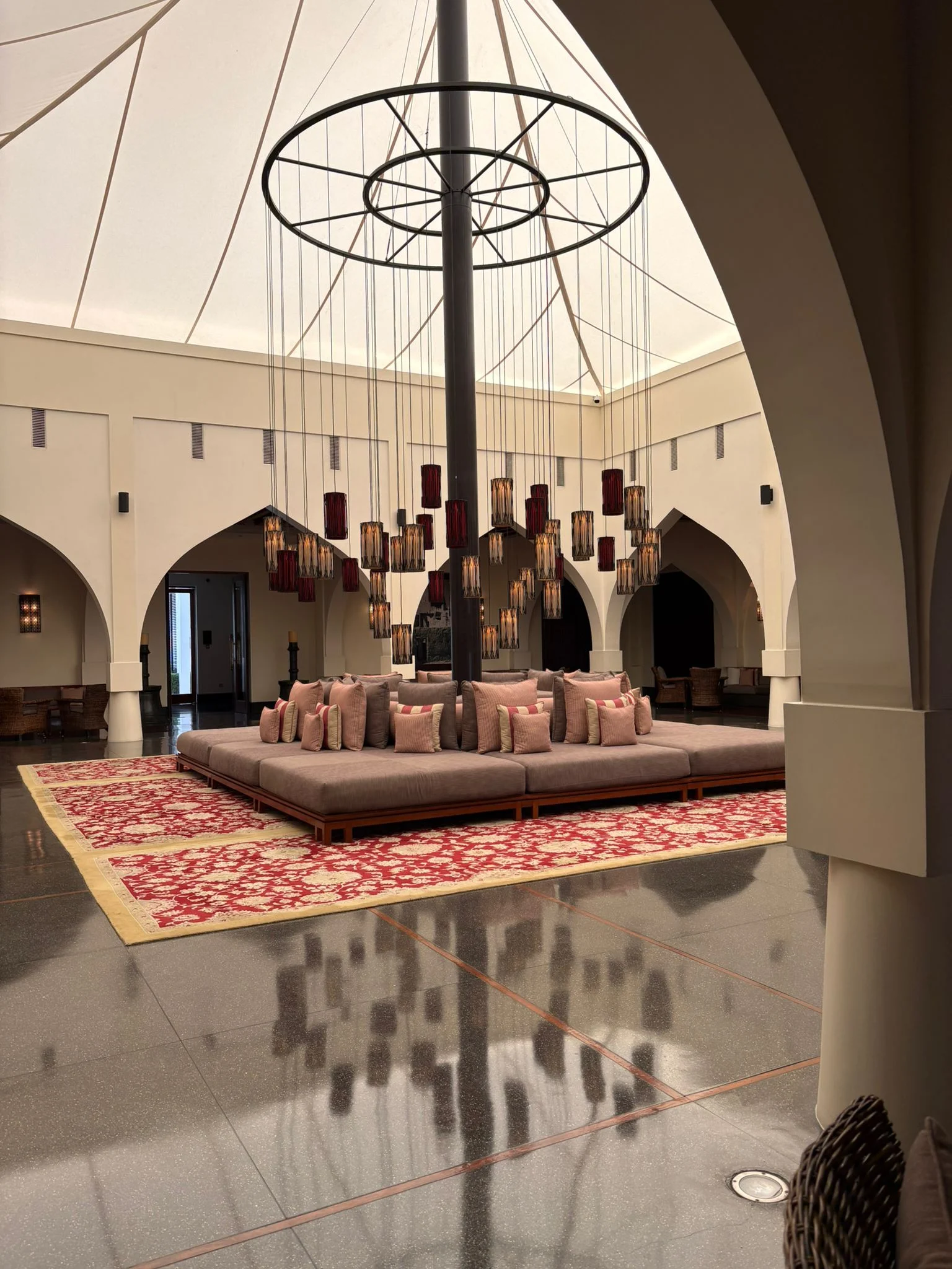 the chedi muscat reception area with elegant architecture and serene luxury arrival space
