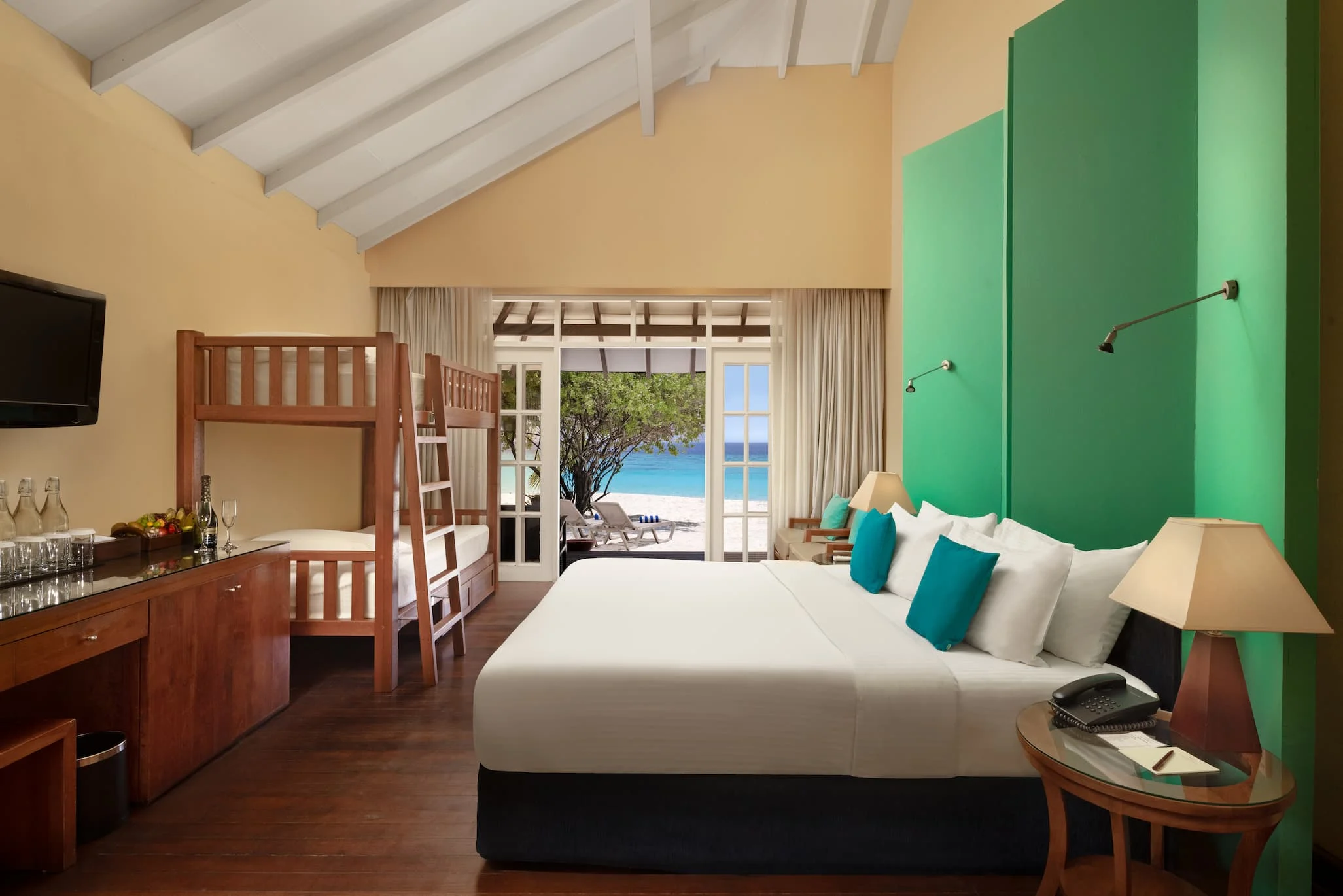 adaaran select meedhupparu one bedroom family beach villa with serene ocean view and beachfront setting maldives