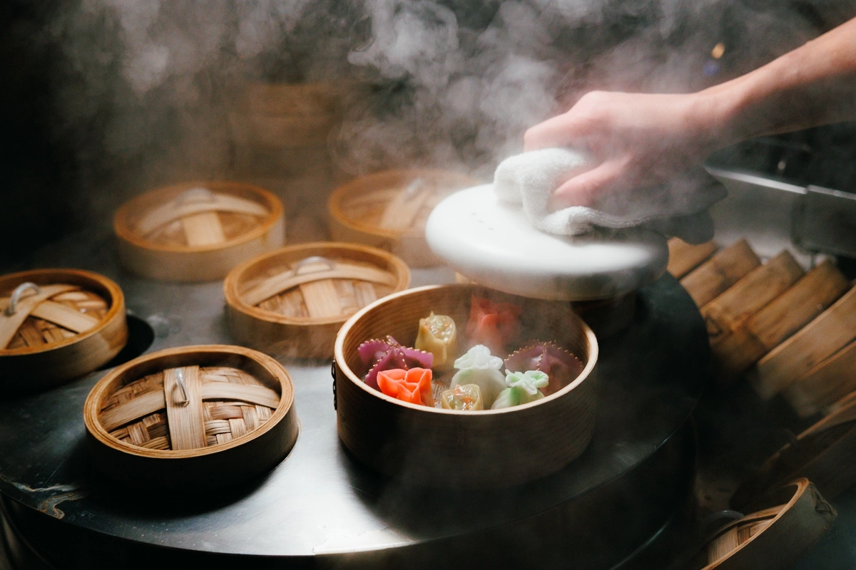 atlantis the palm hakkasan dim sum platter featuring an assortment of refined asian cuisine presented with elegant detail in a luxury dining setting in dubai