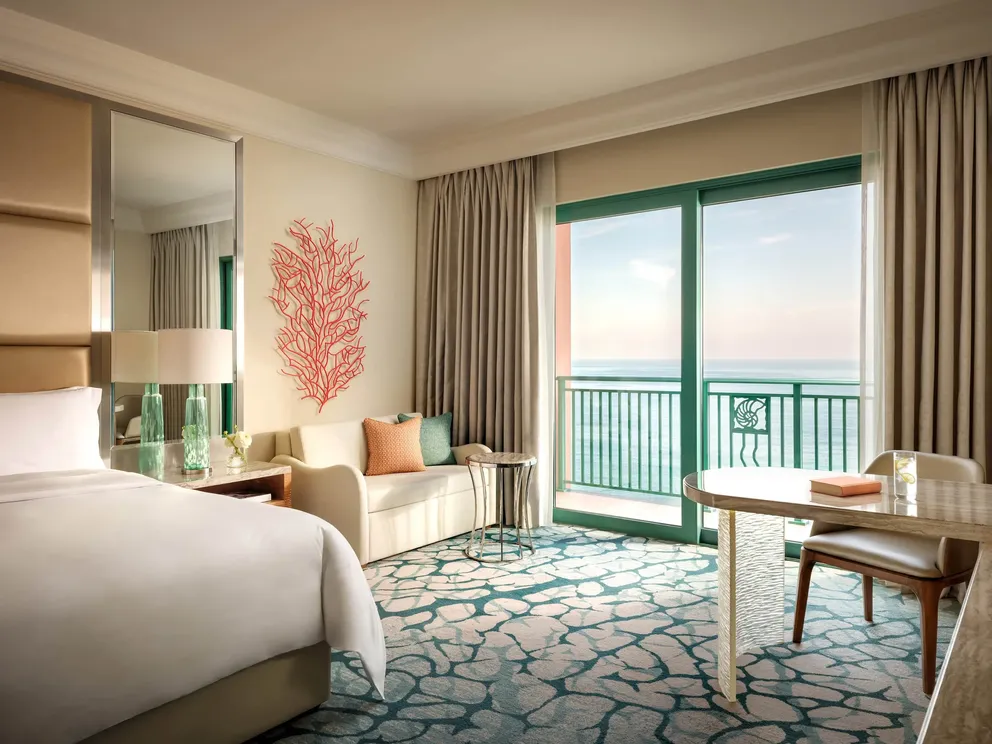 atlantis the palm ocean view room balcony with outdoor seating overlooking the arabian gulf and luxury coastal views in dubai
