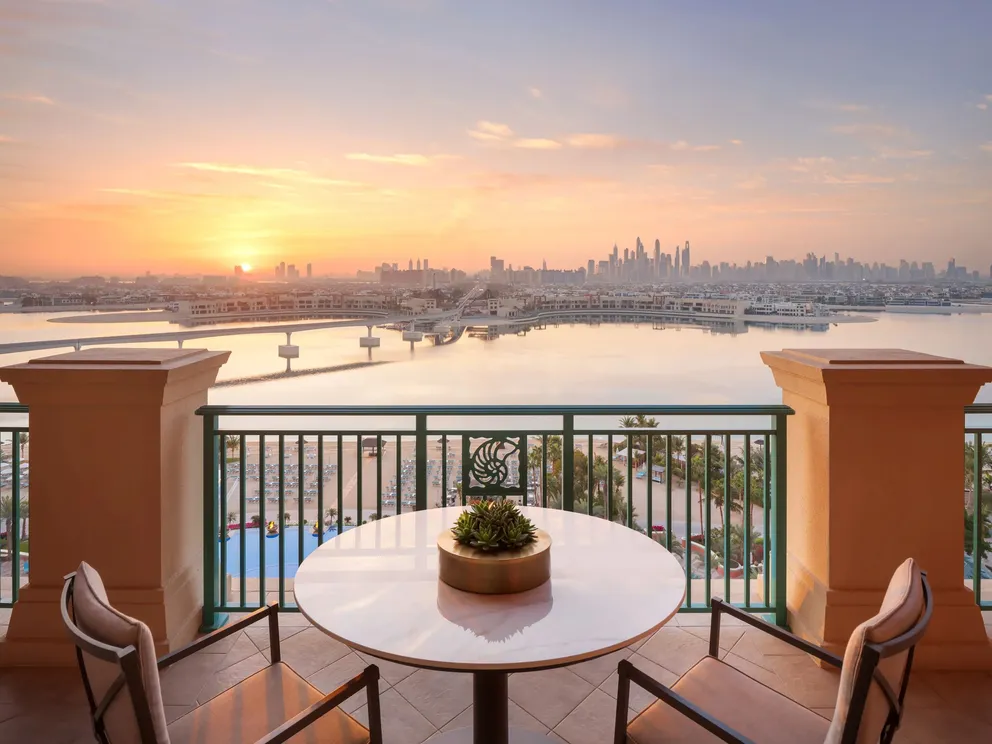 atlantis the palm regal suite balcony with expansive outdoor space, elegant seating and panoramic views across dubai skyline in a refined luxury setting