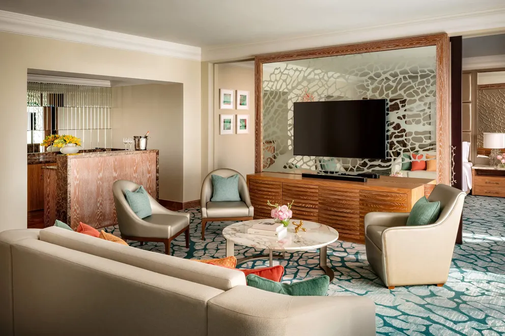 atlantis the palm regal suite living area with spacious layout, elegant furnishings and refined luxury design overlooking dubai skyline