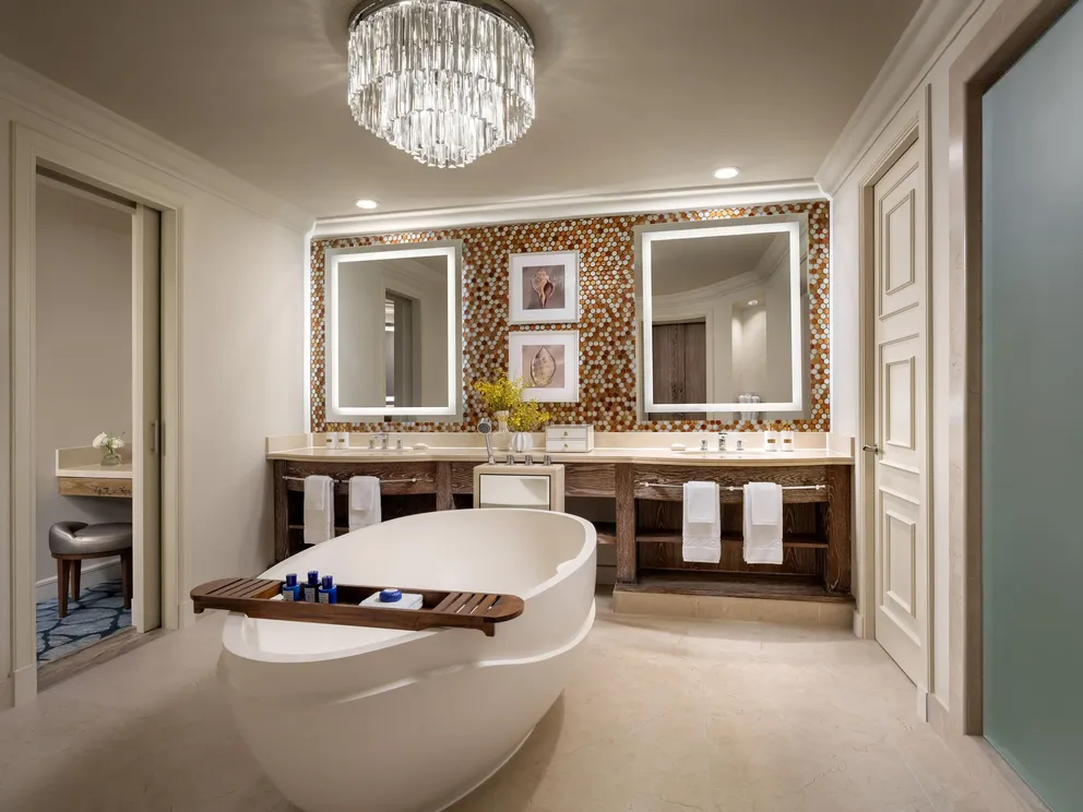 atlantis the palm terrace suite bathroom with luxurious marble finishes, spacious layout and elegant design overlooking dubai skyline