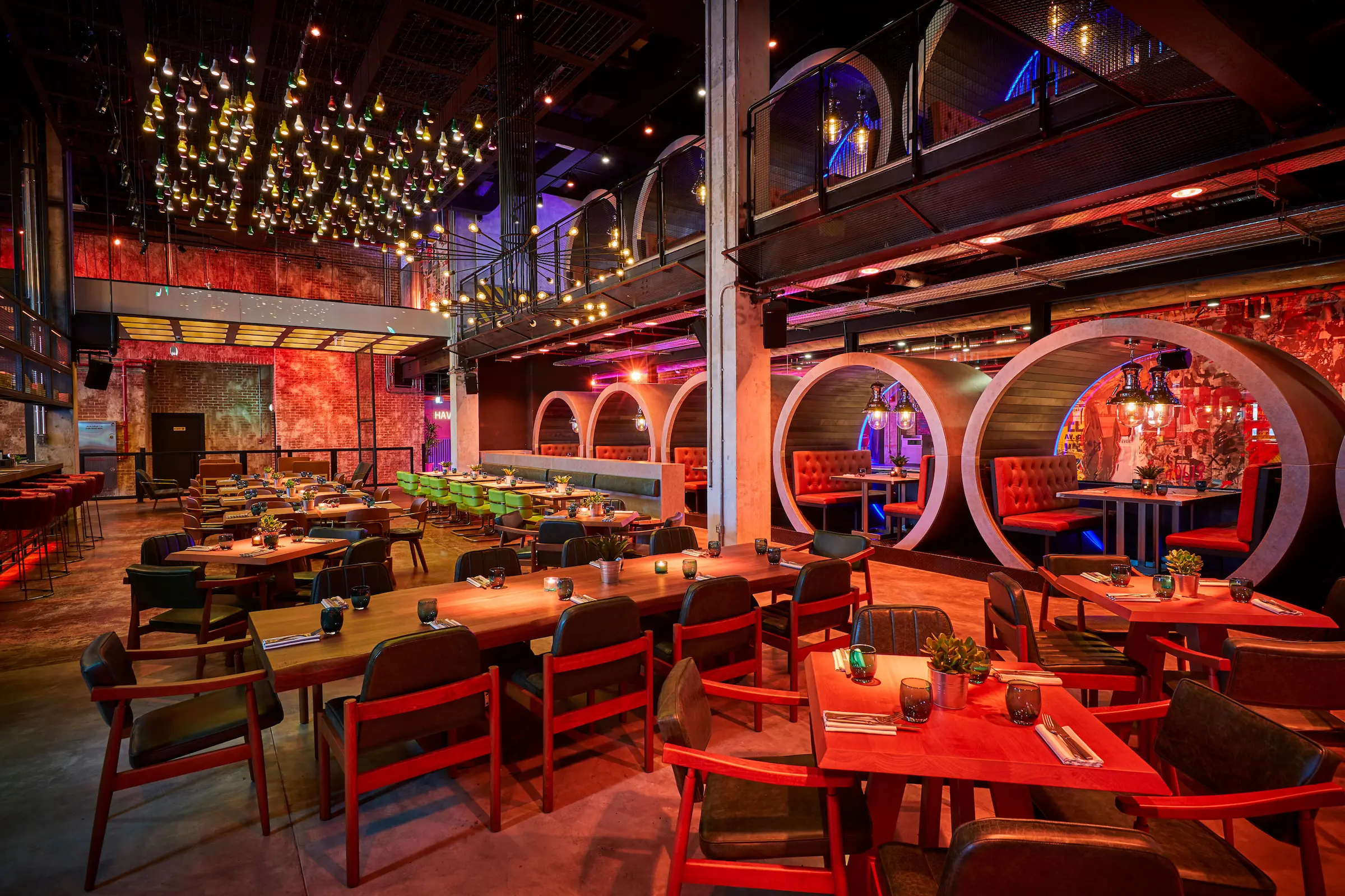 atlantis the palm wavehouse restaurant interior featuring vibrant design, modern decor and a lively family friendly dining atmosphere in dubai