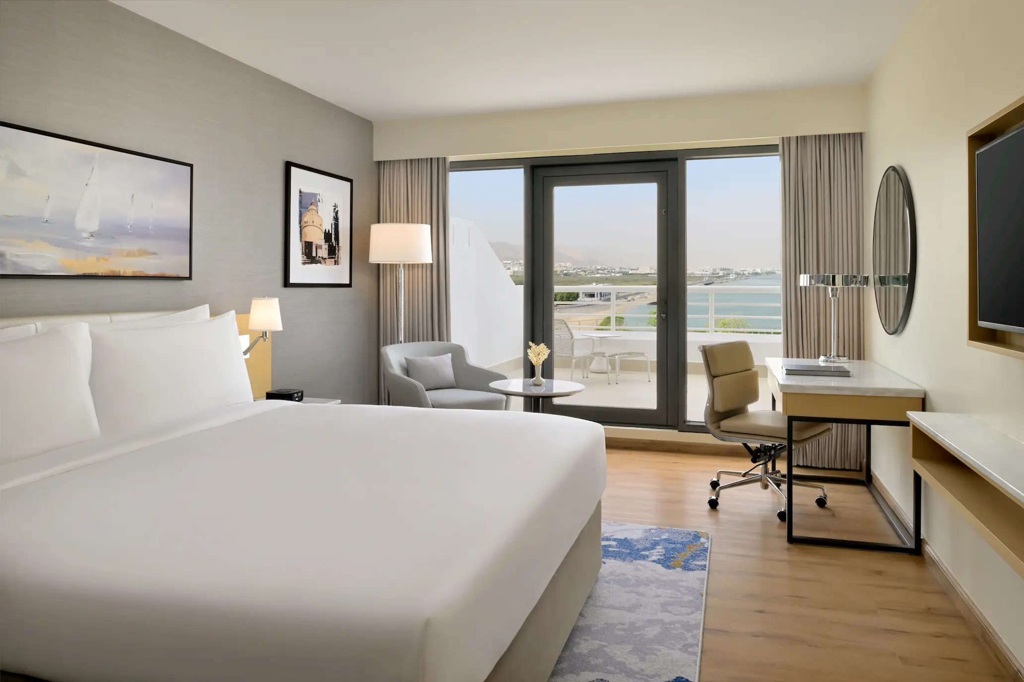 crowne plaza muscat standard sea view room oman elegant interiors with balcony