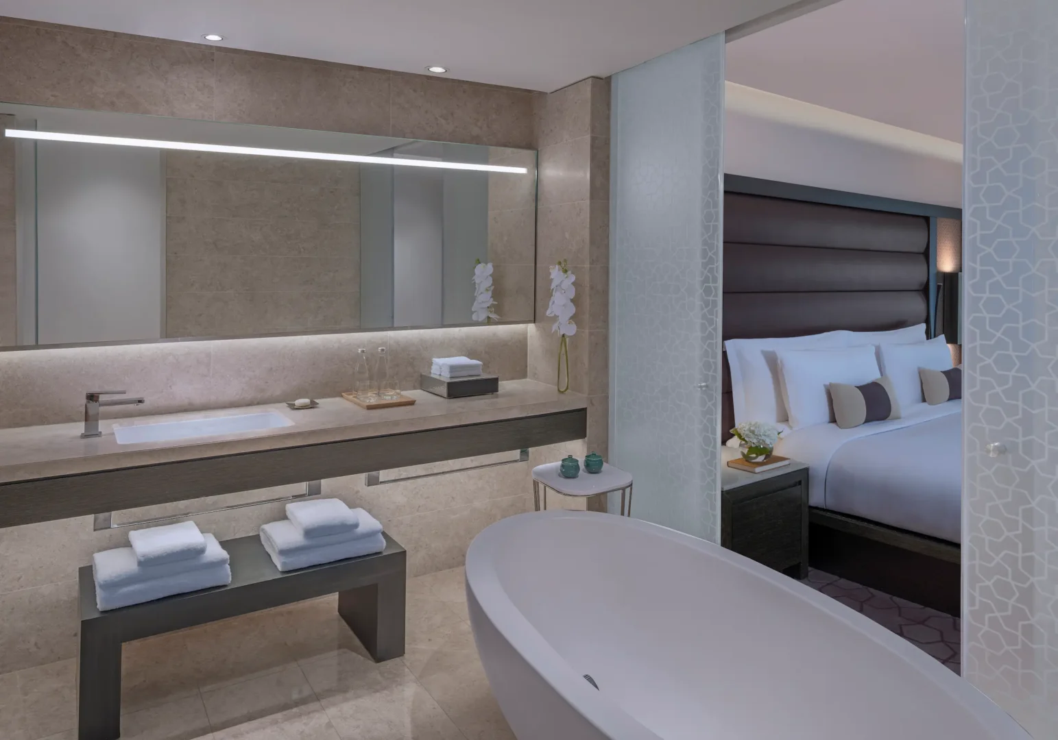 kempinski hotel muscat muscat deluxe sea view room bathroom with vanity and modern interior