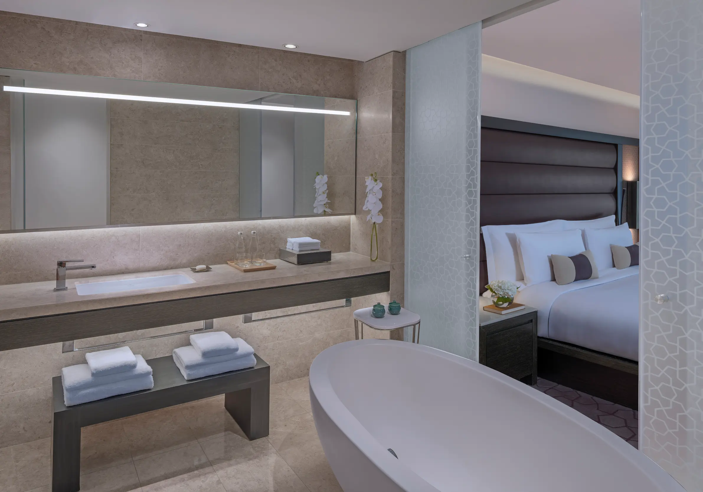 kempinski hotel muscat muscat deluxe sea view room bathroom with vanity and modern interior