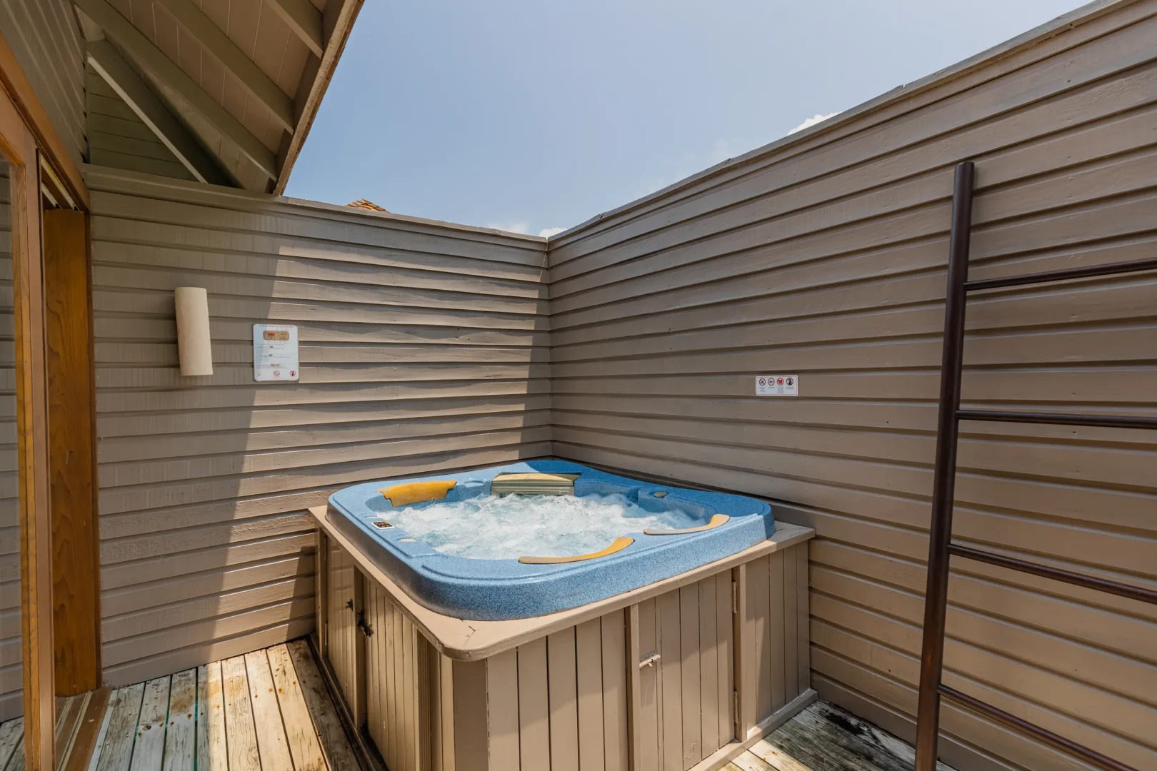 meeru maldives ocean villa jacuzzi set on a private deck overlooking turquoise lagoon with serene ocean views in a tranquil island setting
