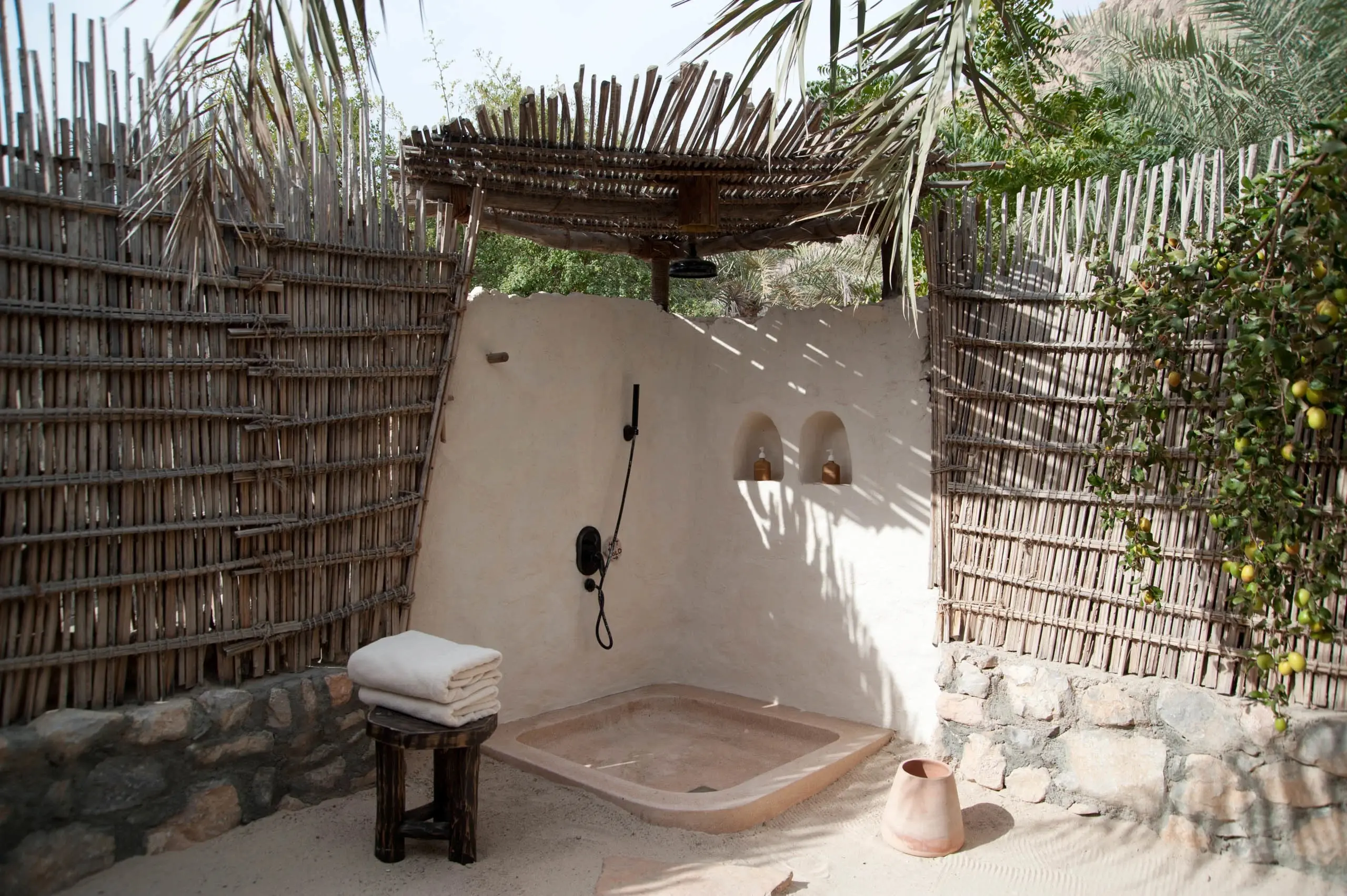 oman six senses zighy bay pool villa suite outdoor shower with private open air design and tranquil natural surroundings