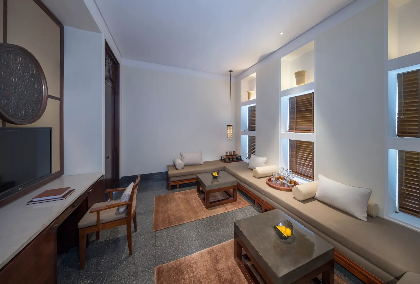 oman the chedi club suite living room with elegant lounge space and refined contemporary design