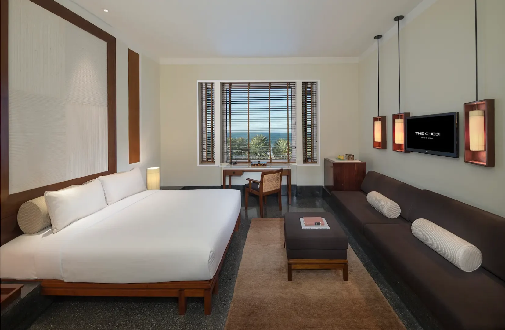 oman the chedi serai room sea view bedroom with elegant coastal outlook