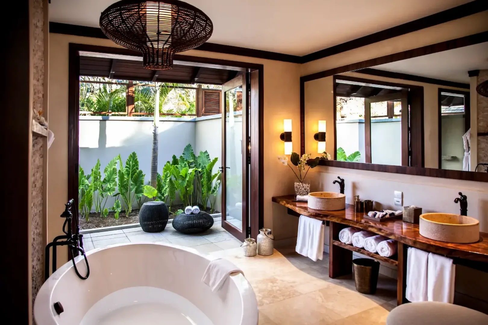 seychelles bathroom stone walls freestanding tub