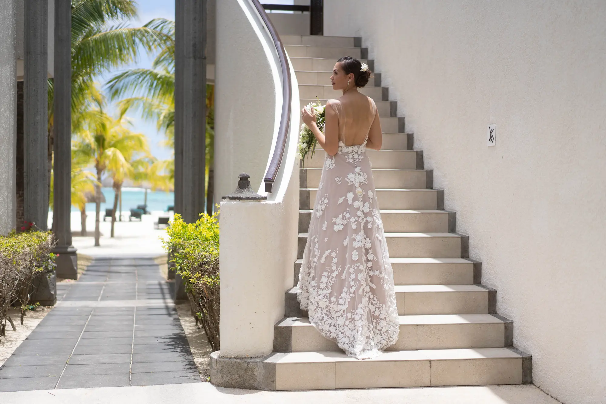 dinarobin beachcomber golf resort spa mauritius bride enjoying an elegant beachfront wedding moment