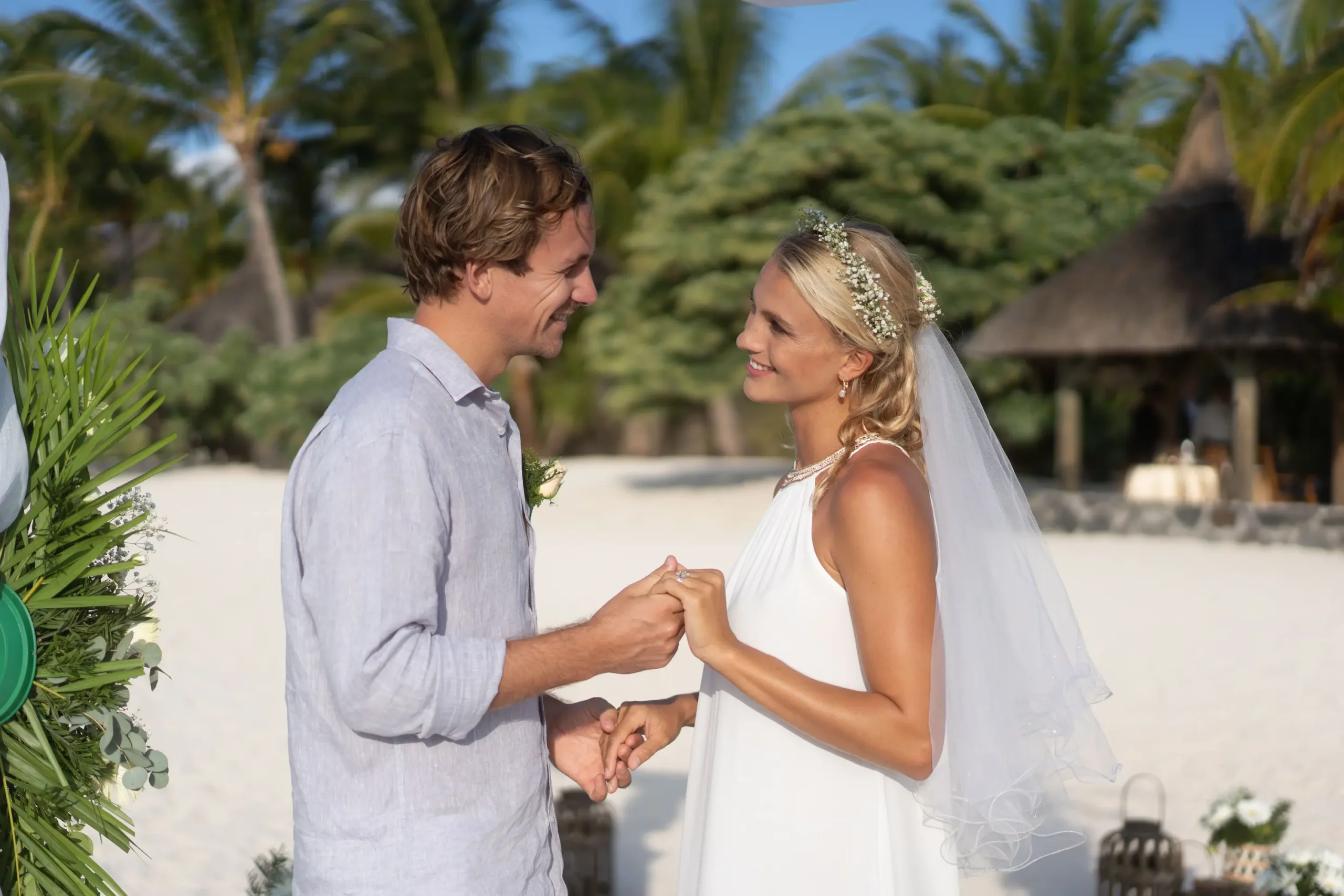 paradis beachcomber golf resort spa mauritius wedding couple celebrating on the beachfront