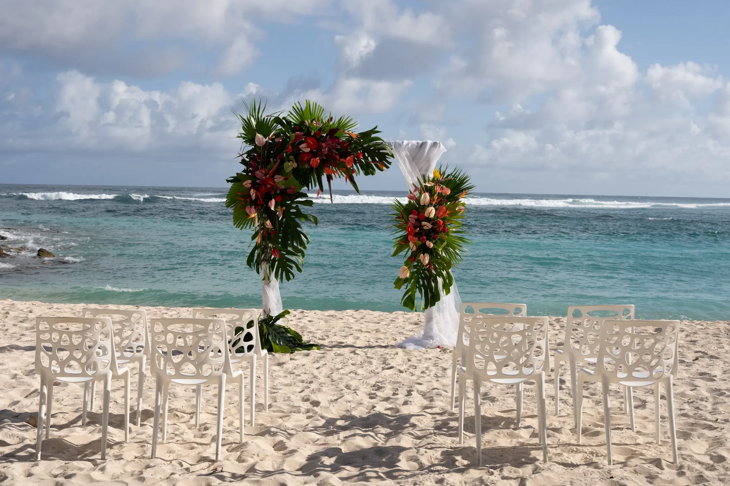 shandrani beachcomber resort spa mauritius wedding setup featuring elegant ceremony décor tropical floral arrangements and luxury celebration styling within the resort grounds