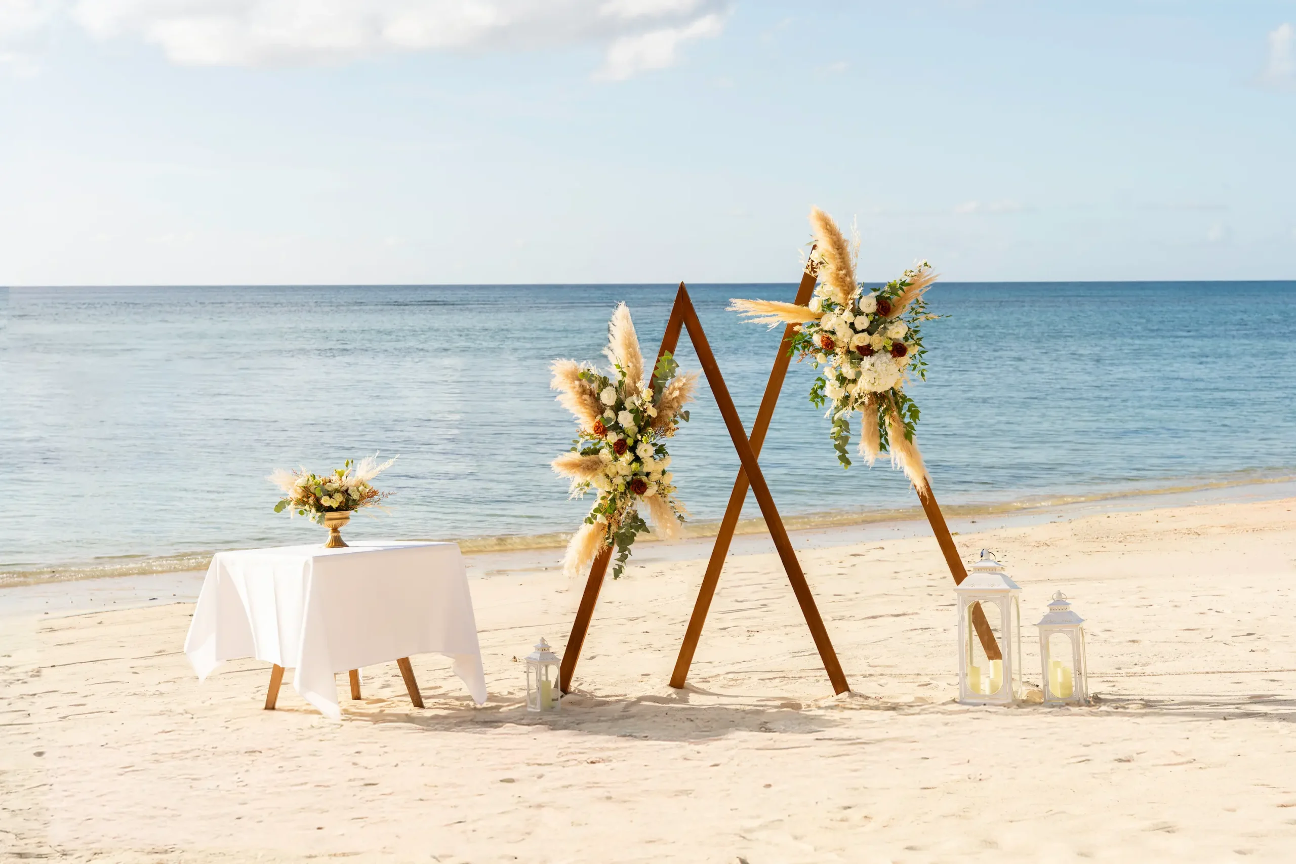 victoria beachcomber resort spa mauritius wedding beach setup featuring elegant ceremony seating tropical floral decorations and a luxury oceanfront setting for a romantic island celebration