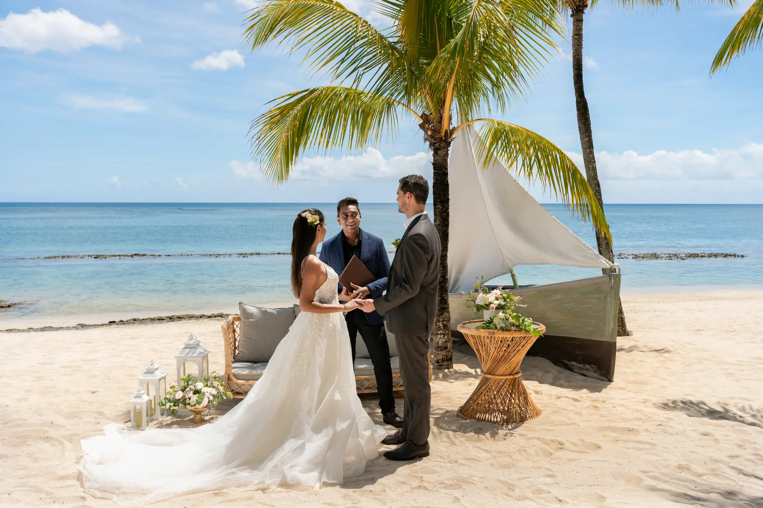 victoria beachcomber resort spa mauritius wedding lifestyle experience featuring a newlywed couple enjoying romantic moments by the ocean with elegant resort surroundings and a luxury beachfront atmosphere