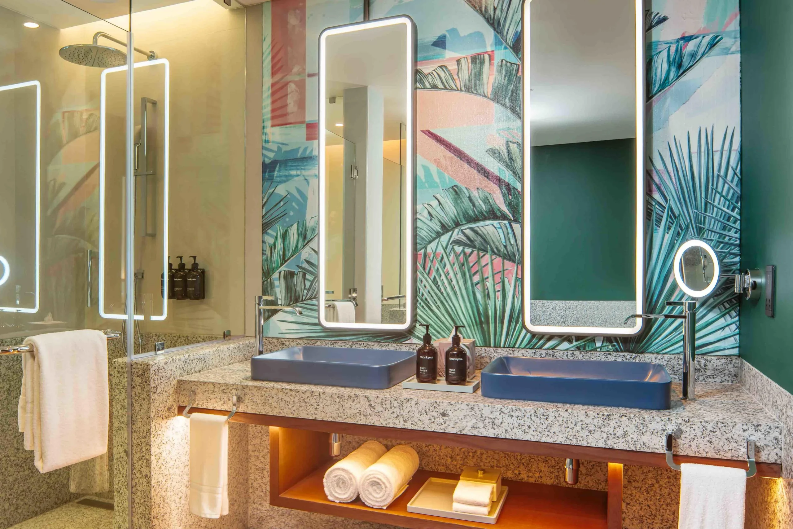 Bathroom in the King One Bedroom Apartment with Private Pool at Canopy by Hilton Seychelles Resort in Mahé, Seychelles, featuring modern fixtures and contemporary island-inspired design.