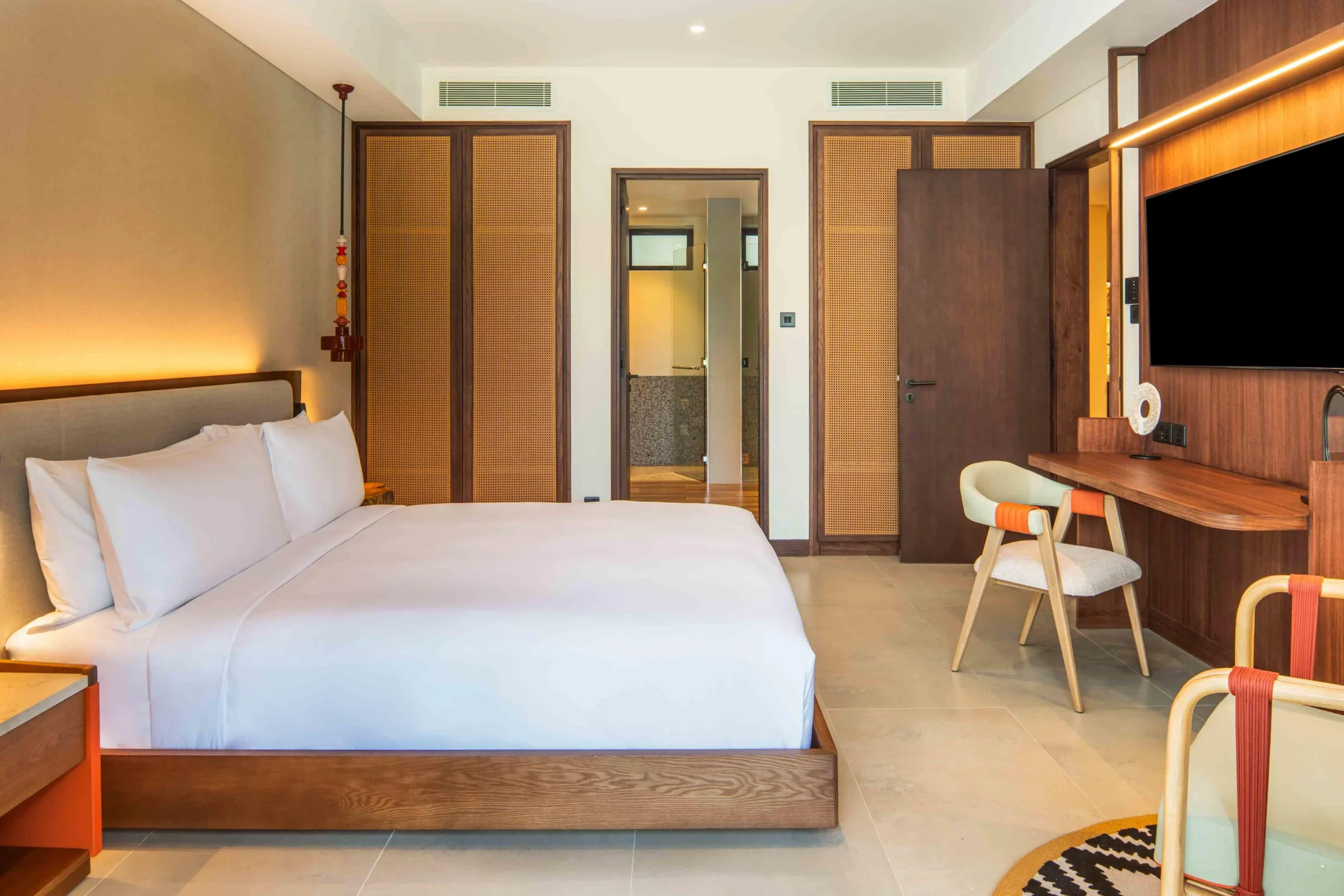 Interior of the King One Bedroom Apartment with Private Pool at Canopy by Hilton Seychelles Resort in Mahé, Seychelles, featuring contemporary island-inspired décor, spacious living areas and direct access to a private pool.