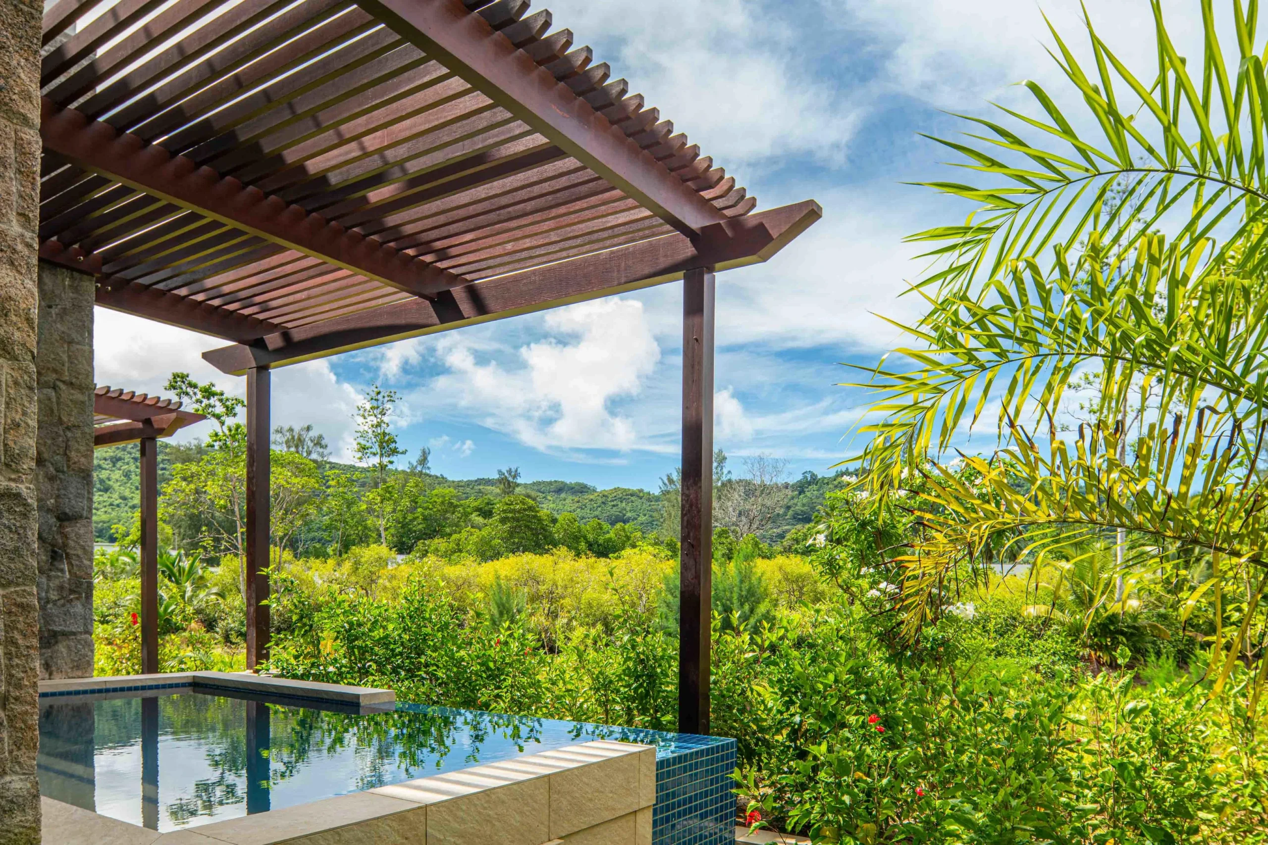 Exterior of the King One Bedroom Apartment with Private Pool at Canopy by Hilton Seychelles Resort in Mahé, Seychelles, featuring a private pool and outdoor terrace area.