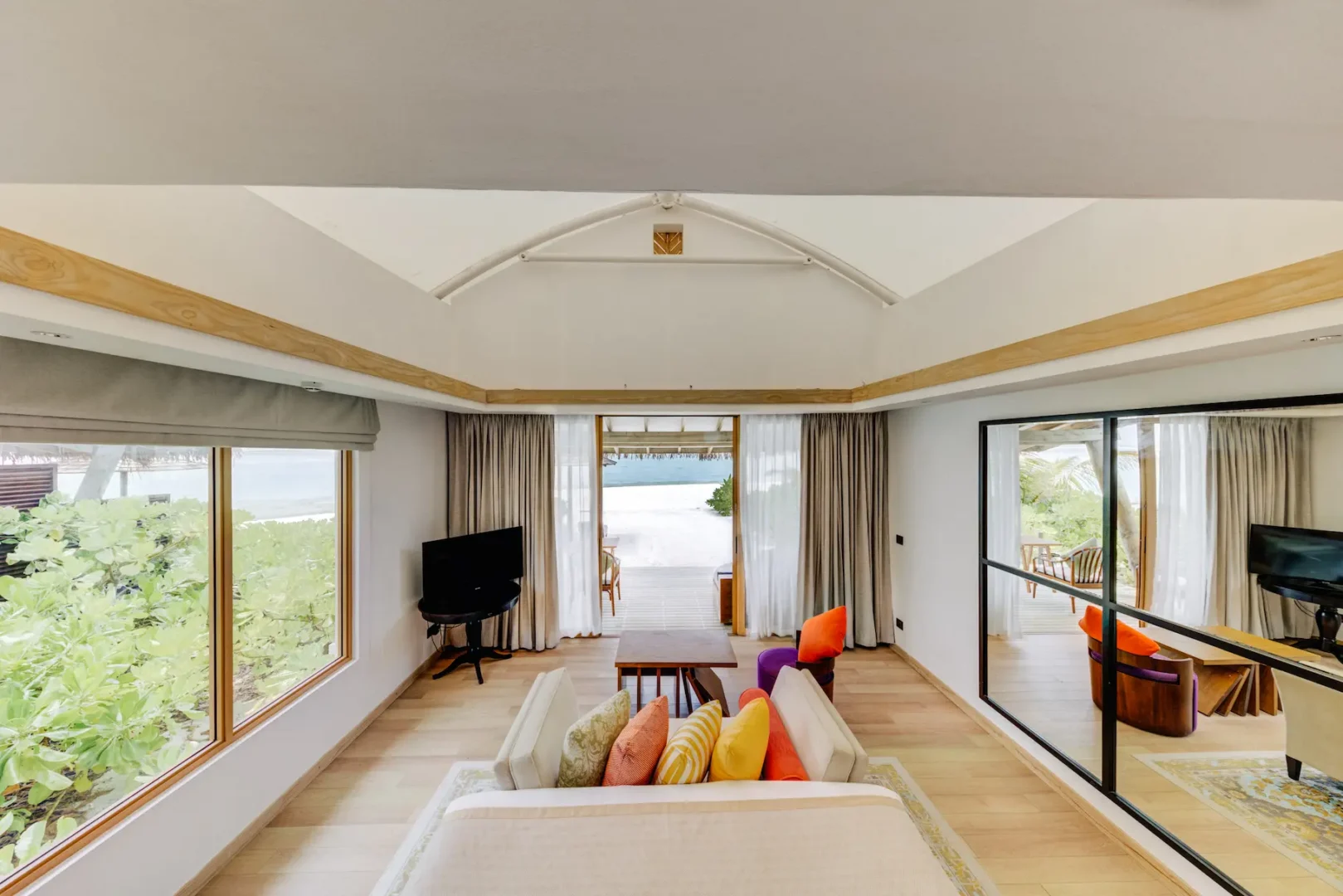 Bedroom interior of a Platinum Beach Bungalow at Cinnamon Hakuraa Huraa Maldives, Maldives