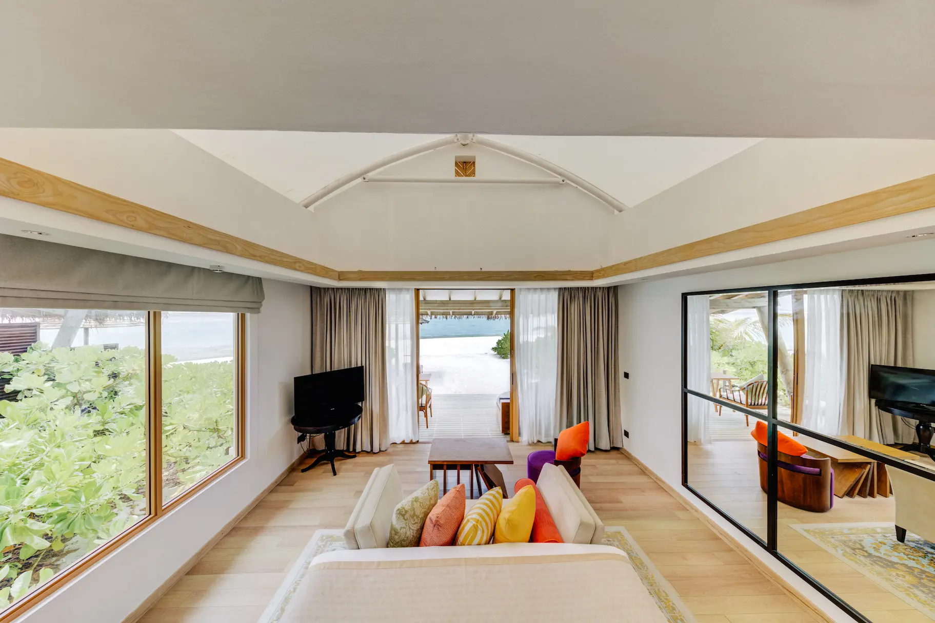 Bedroom interior of a Platinum Beach Bungalow at Cinnamon Hakuraa Huraa Maldives, Maldives