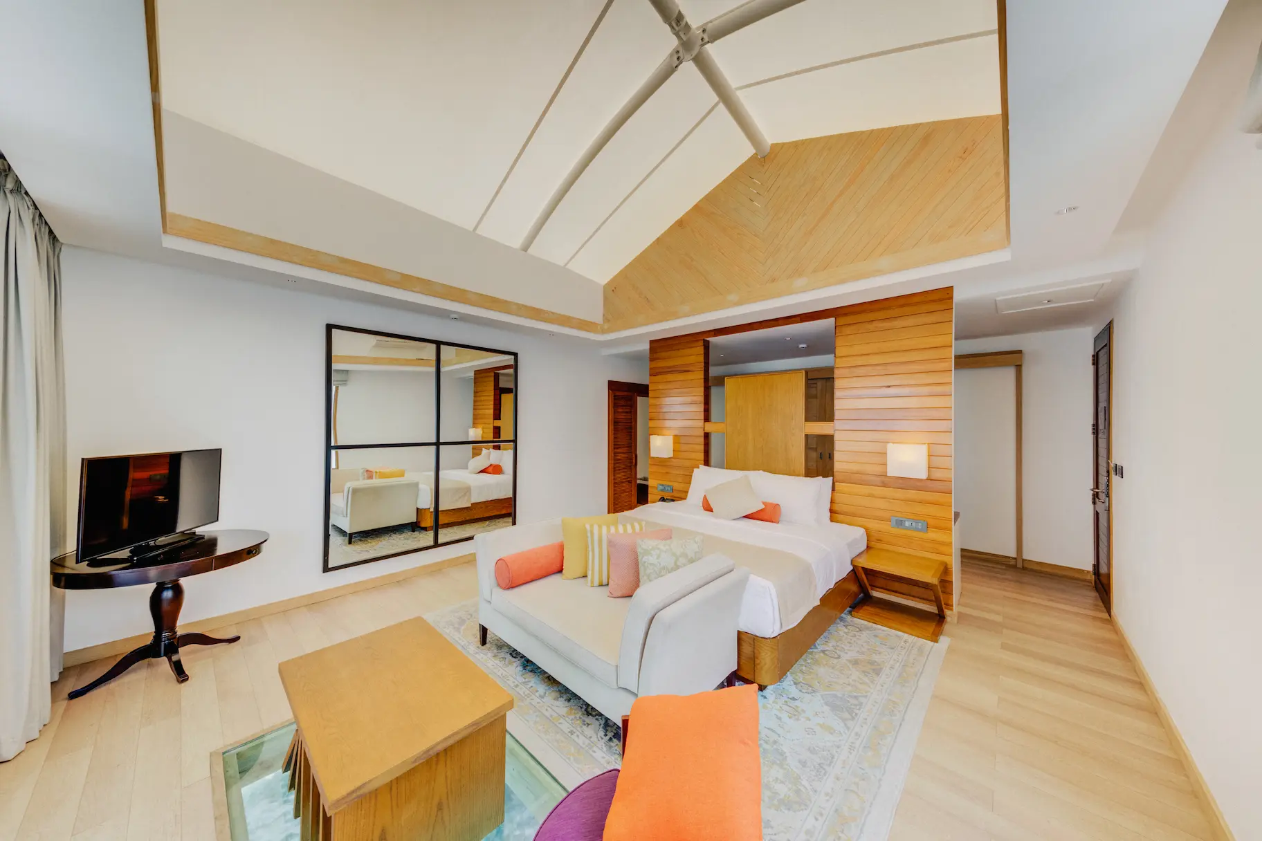 Bedroom interior of a Water Bungalow at Cinnamon Hakuraa Huraa Maldives, Maldives