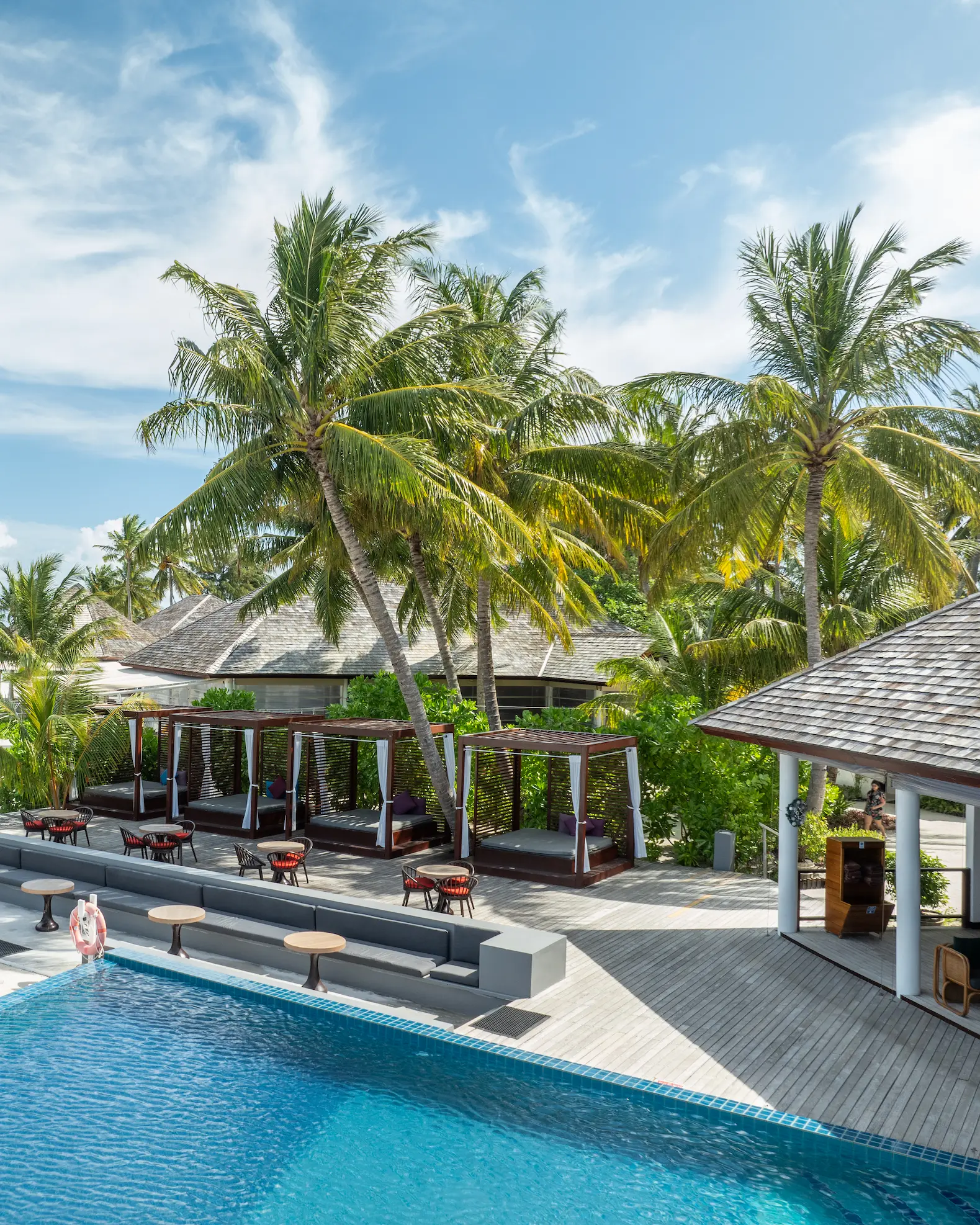 Pool cabanas at Cinnamon Hakuraa Huraa Maldives, Maldives.