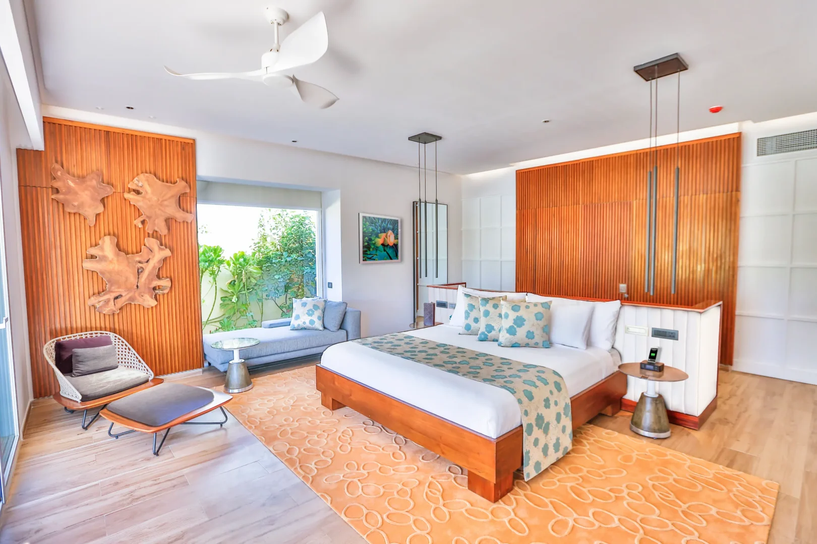 interior of a beach villa at emerald maldives resort & spa in the maldives featuring contemporary furnishings and spacious living space