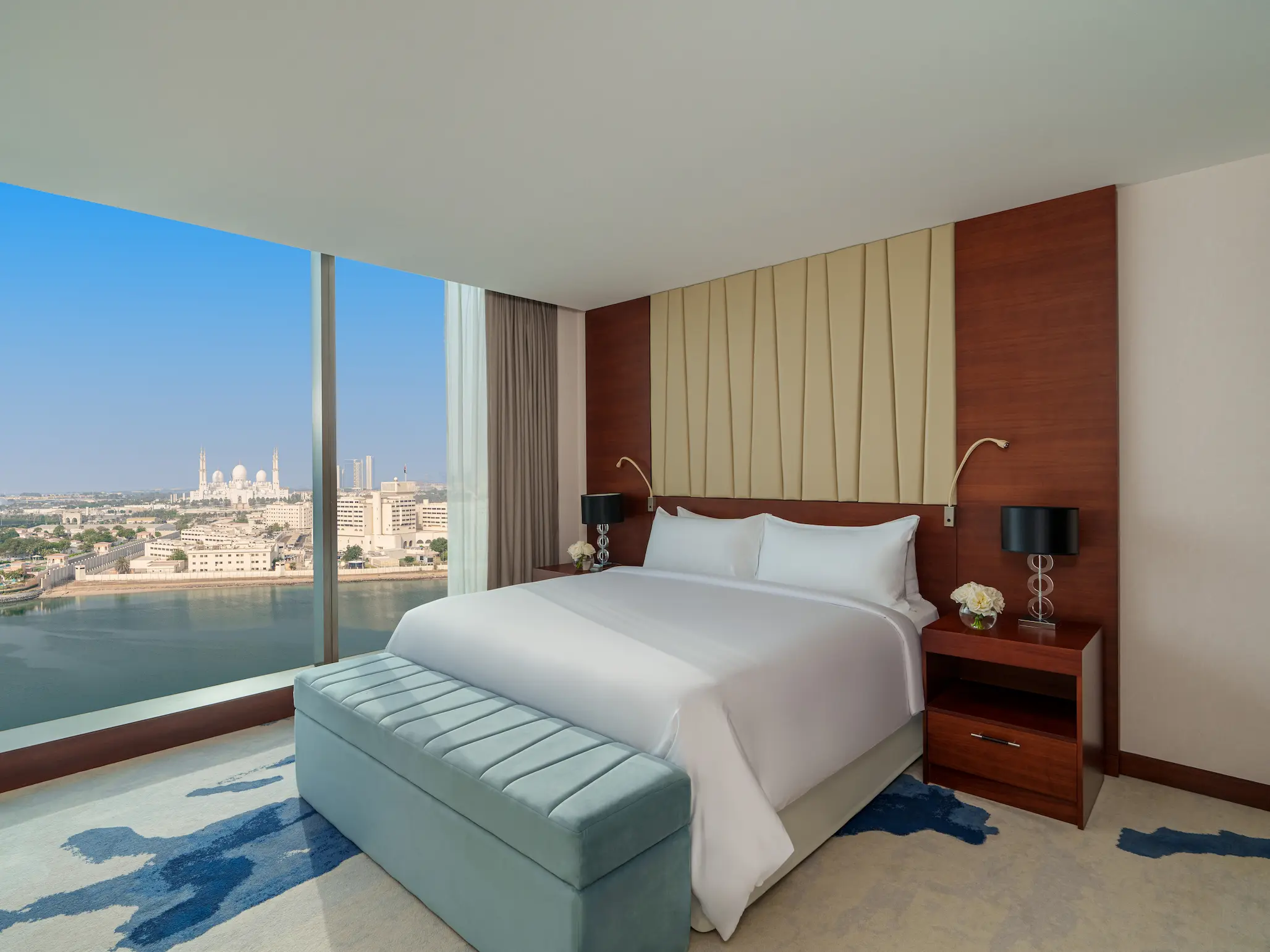 Junior Suite interior at Fairmont Bab Al Bahr Abu Dhabi featuring spacious contemporary accommodation and elegant furnishings