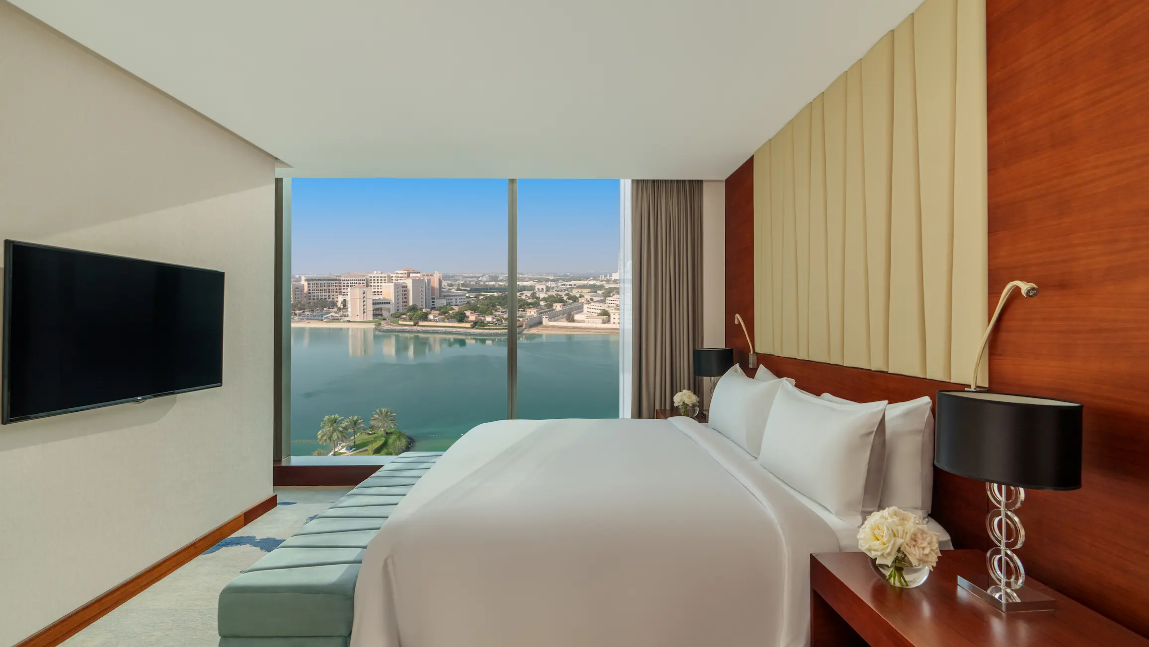 Junior View Suite at Fairmont Bab Al Bahr Abu Dhabi with spacious accommodation and views across Abu Dhabi Creek